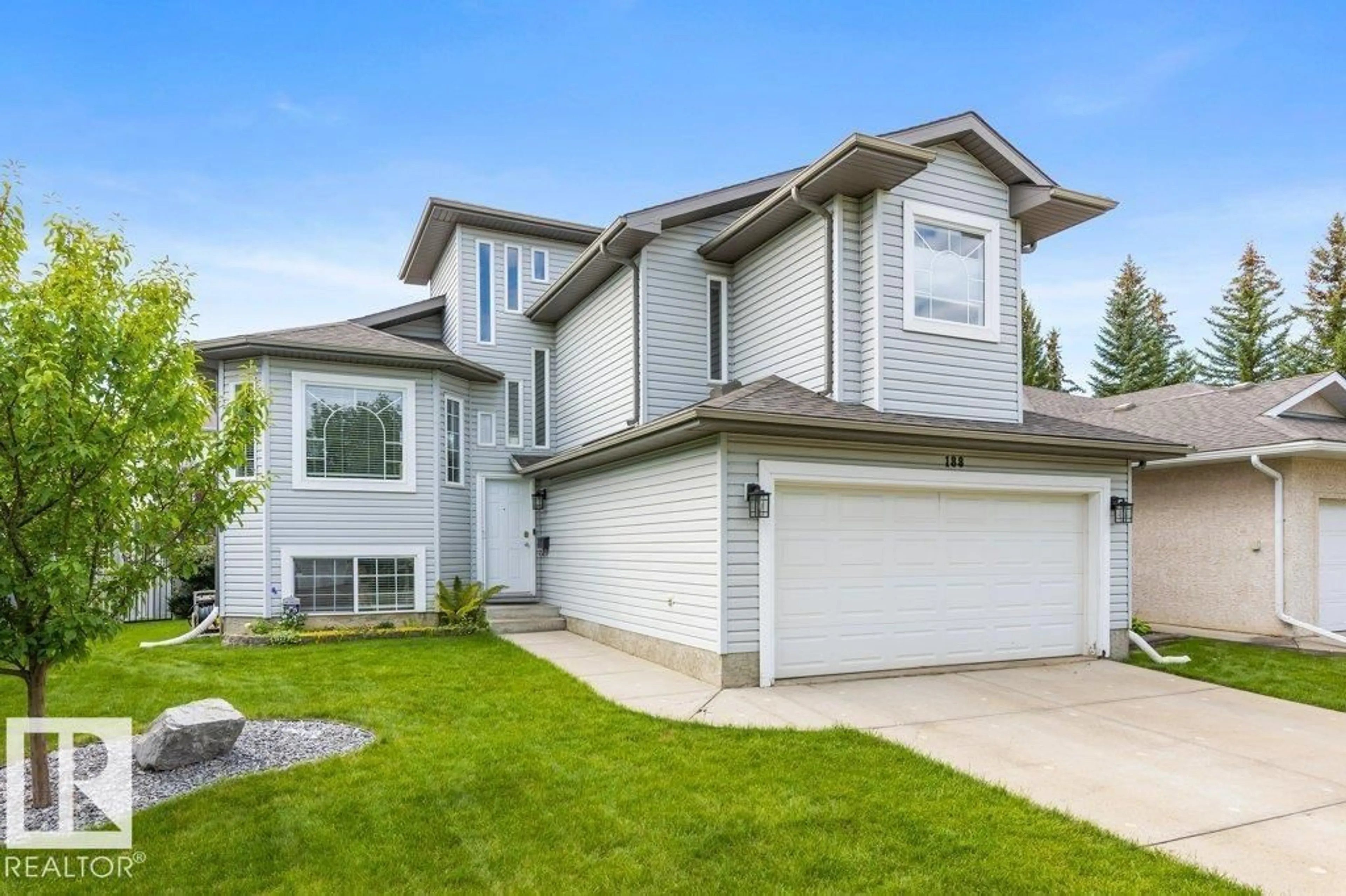 Home with vinyl exterior material, street for 188 HERITAGE DR, St. Albert Alberta T8N5W4