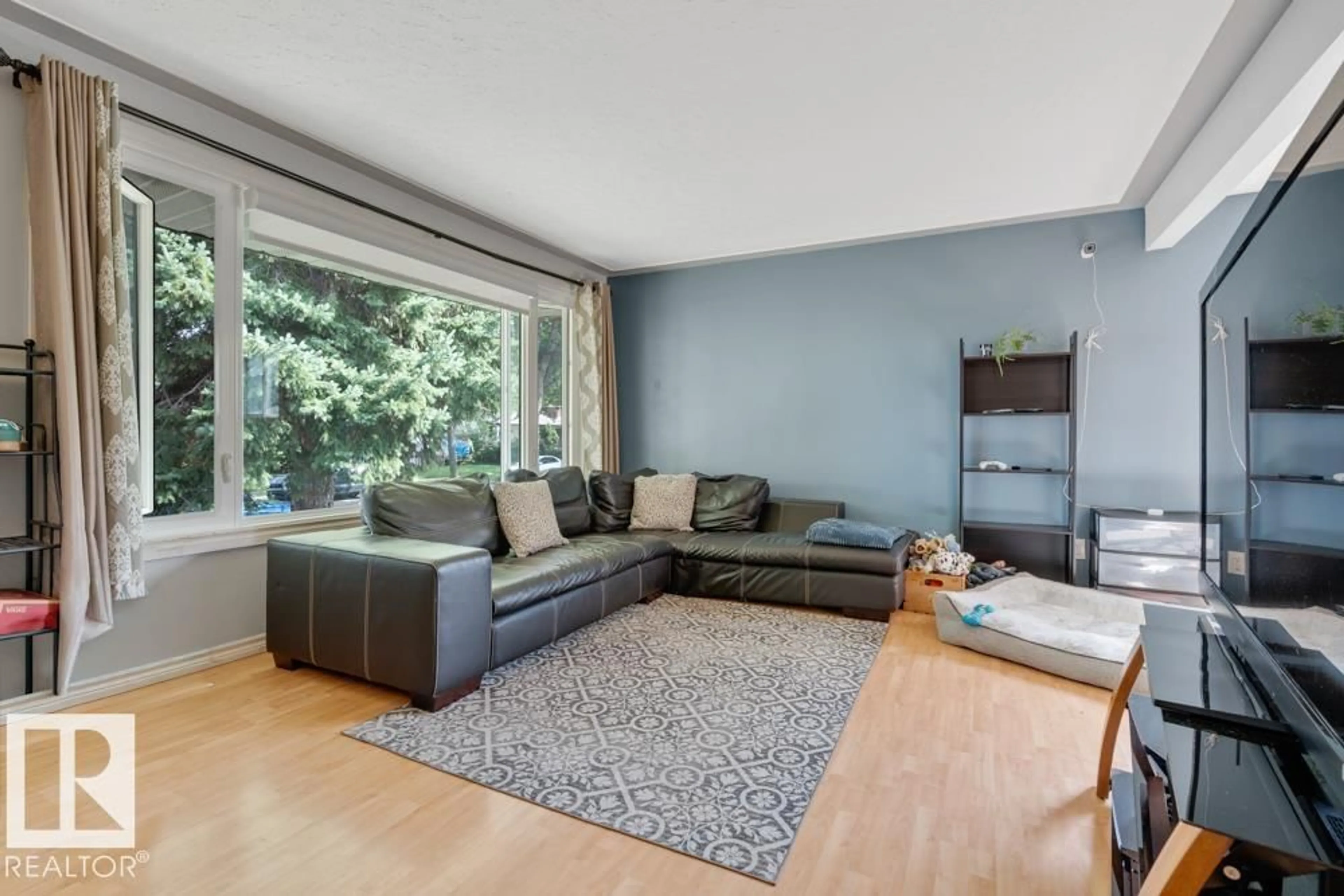 Living room with furniture, unknown for 12026 38 ST NW, Edmonton Alberta T5W2H8