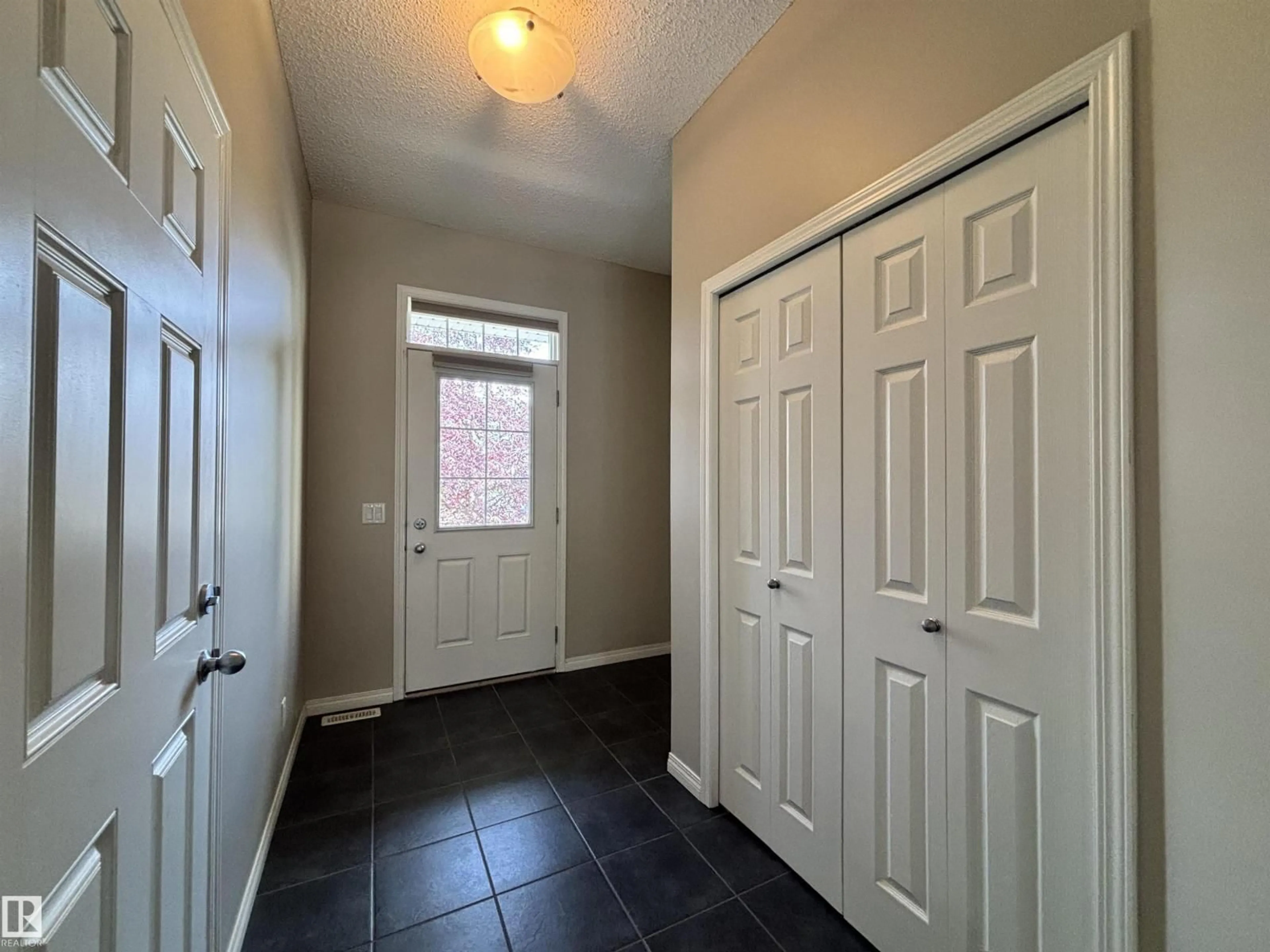 Indoor entryway for 2317 76 ST, Edmonton Alberta T6X1S6