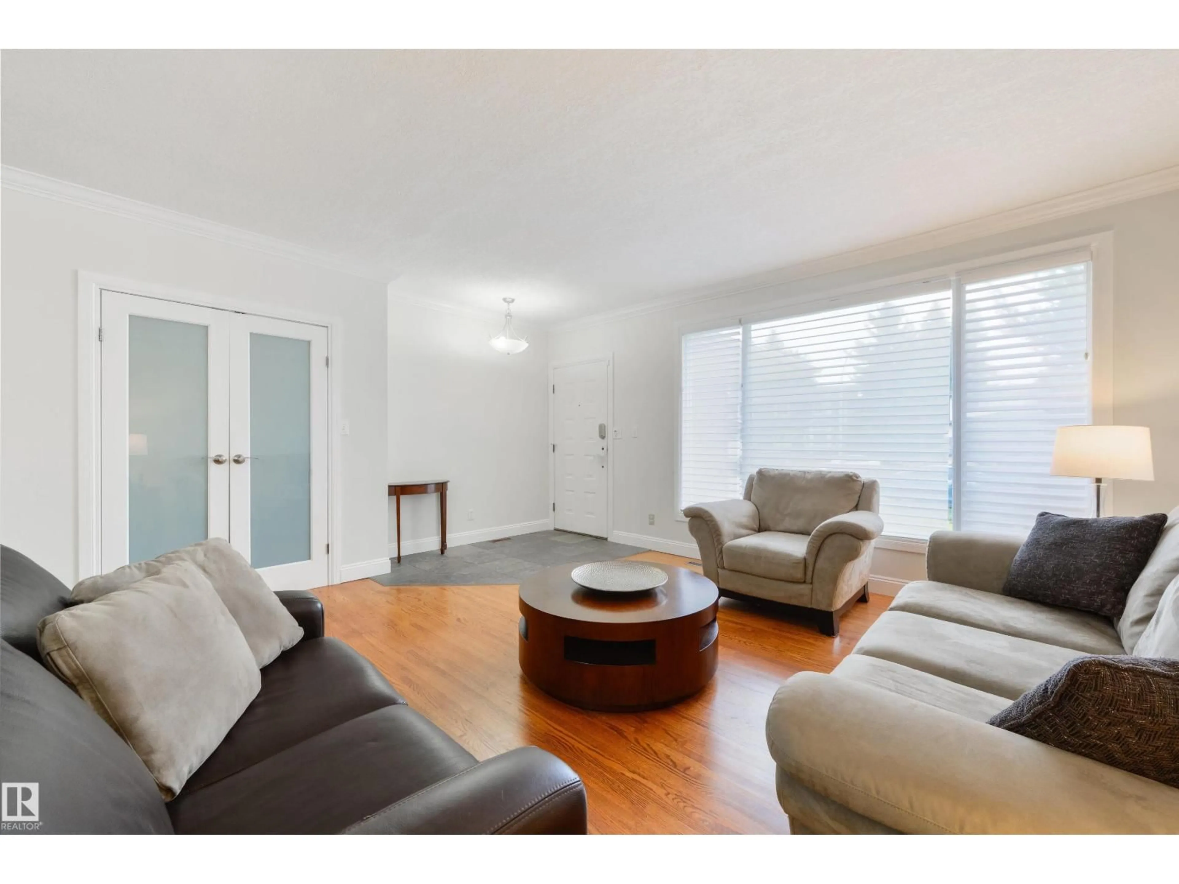 Living room with furniture, wood/laminate floor for 256 WESTRIDGE RD, Edmonton Alberta T5T1C3