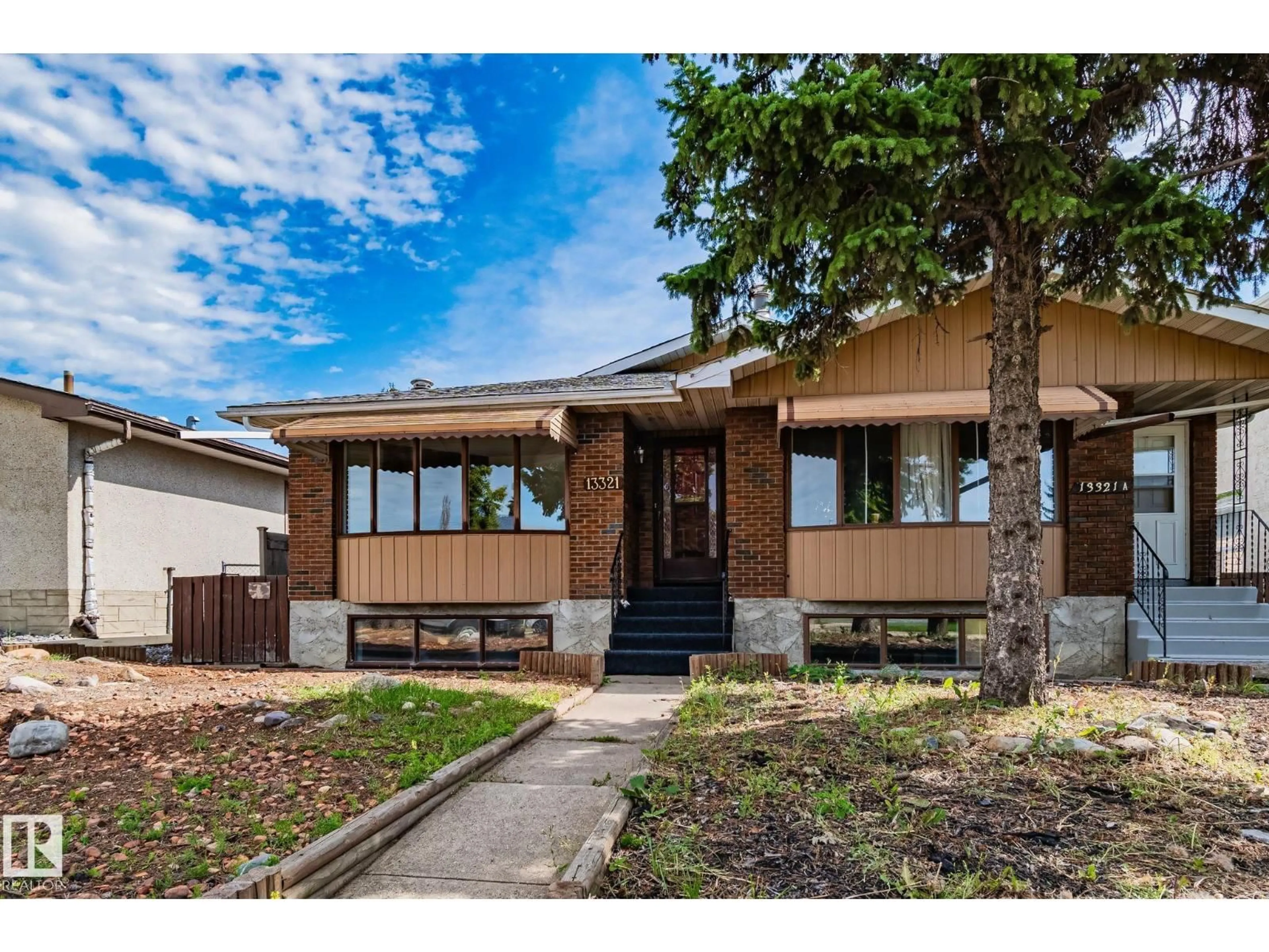 Home with vinyl exterior material, street for NW - 13321 119 ST, Edmonton Alberta T5E5M6