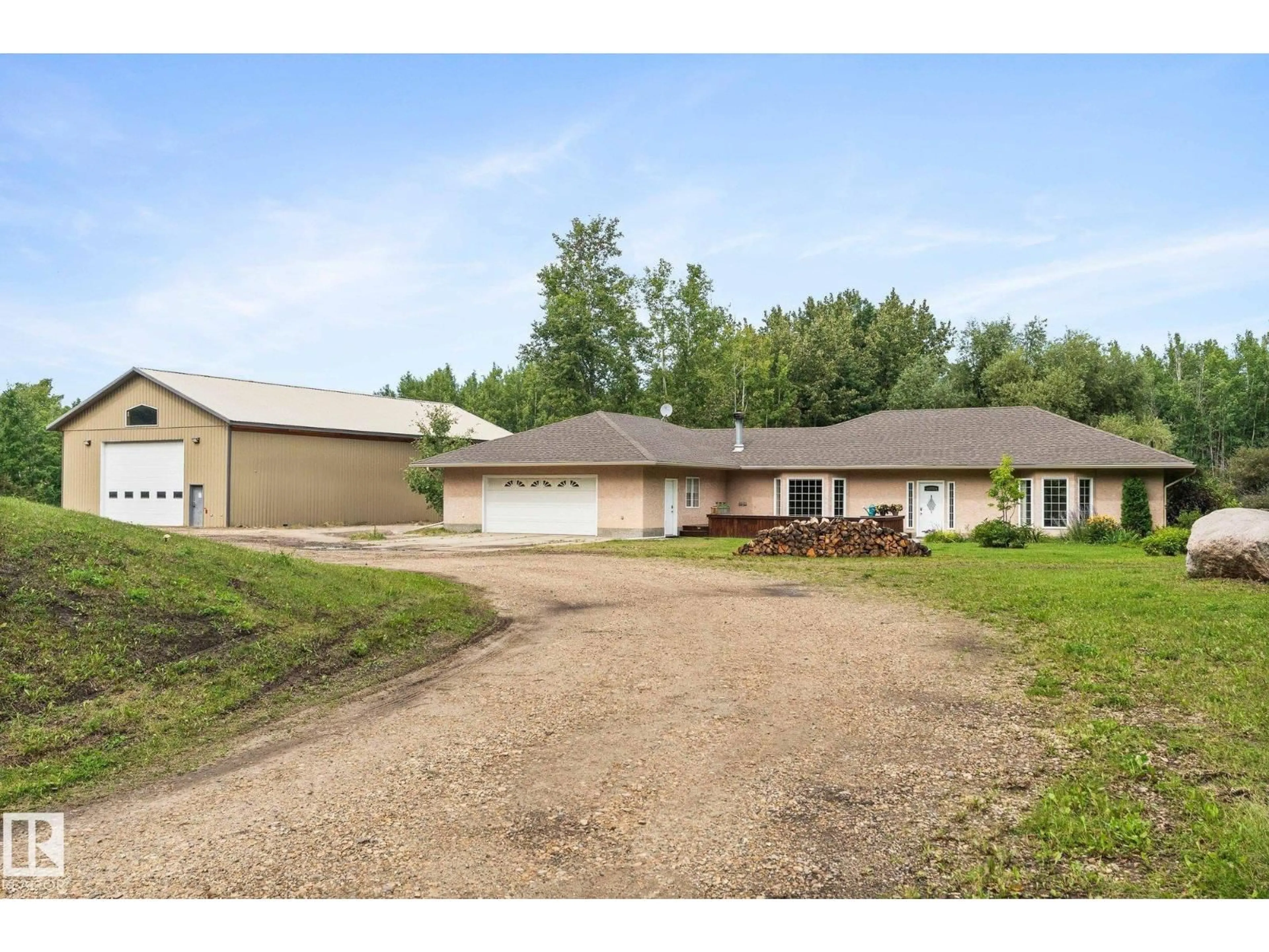 A pic from outside/outdoor area/front of a property/back of a property/a pic from drone, unknown for 53510 - 151 HWY 43, Rural Lac Ste. Anne County Alberta T0E1V0