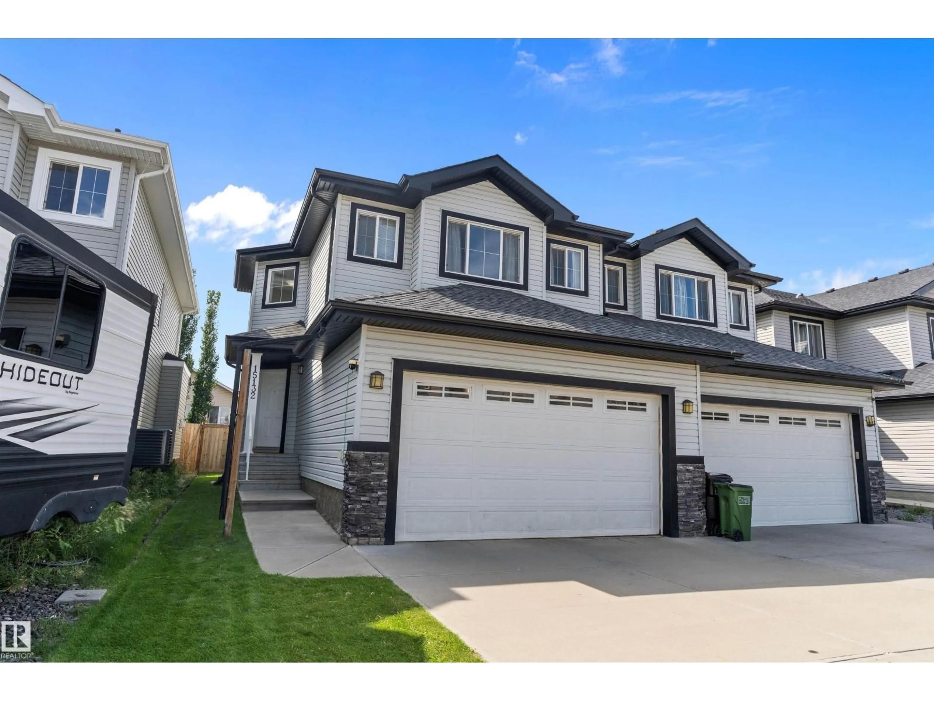 Home with vinyl exterior material, street for NW - 15132 31 ST, Edmonton Alberta T5Y0S3