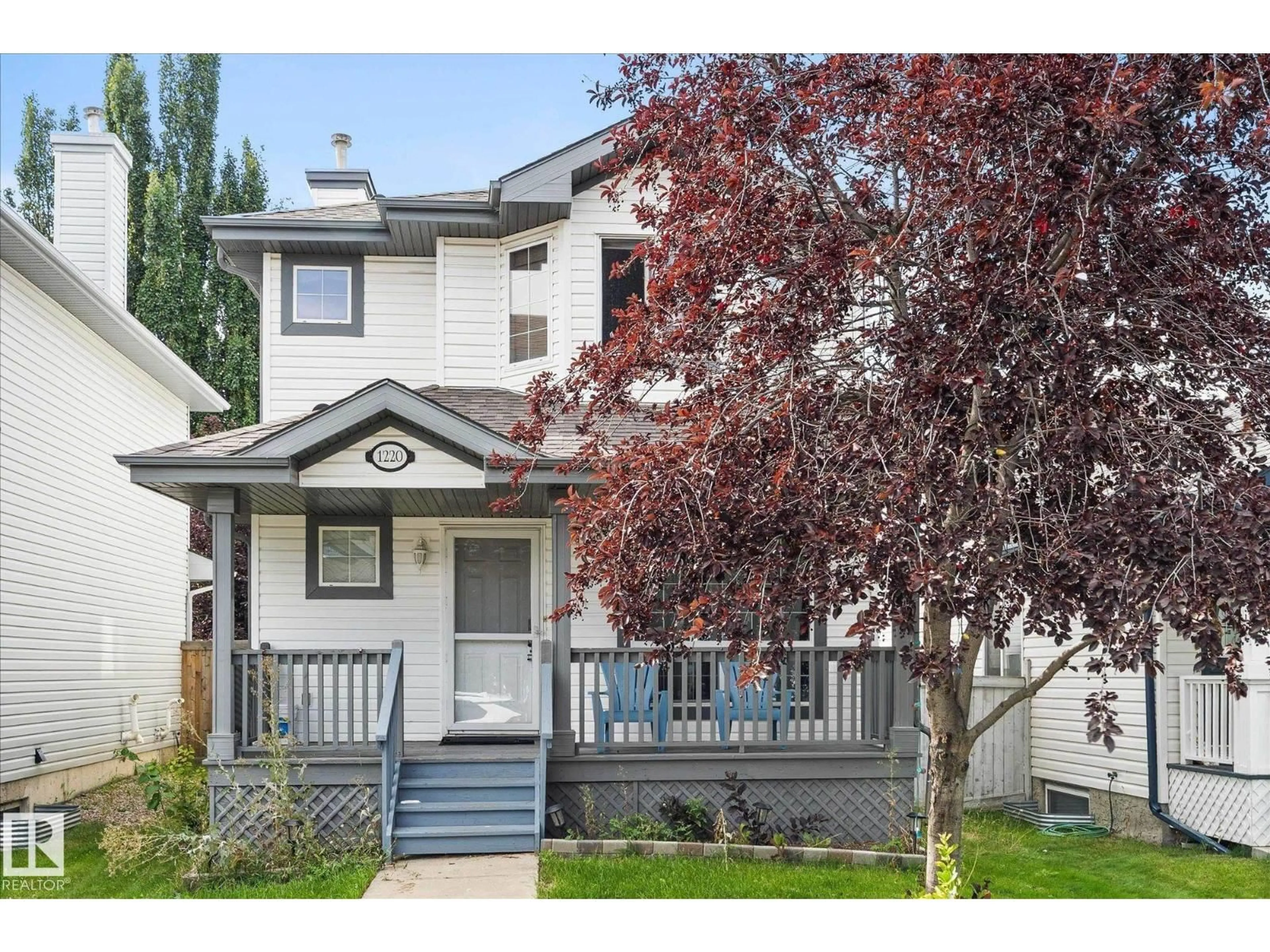 Home with vinyl exterior material, street for 1220 GILLESPIE CR, Edmonton Alberta T5T6M6