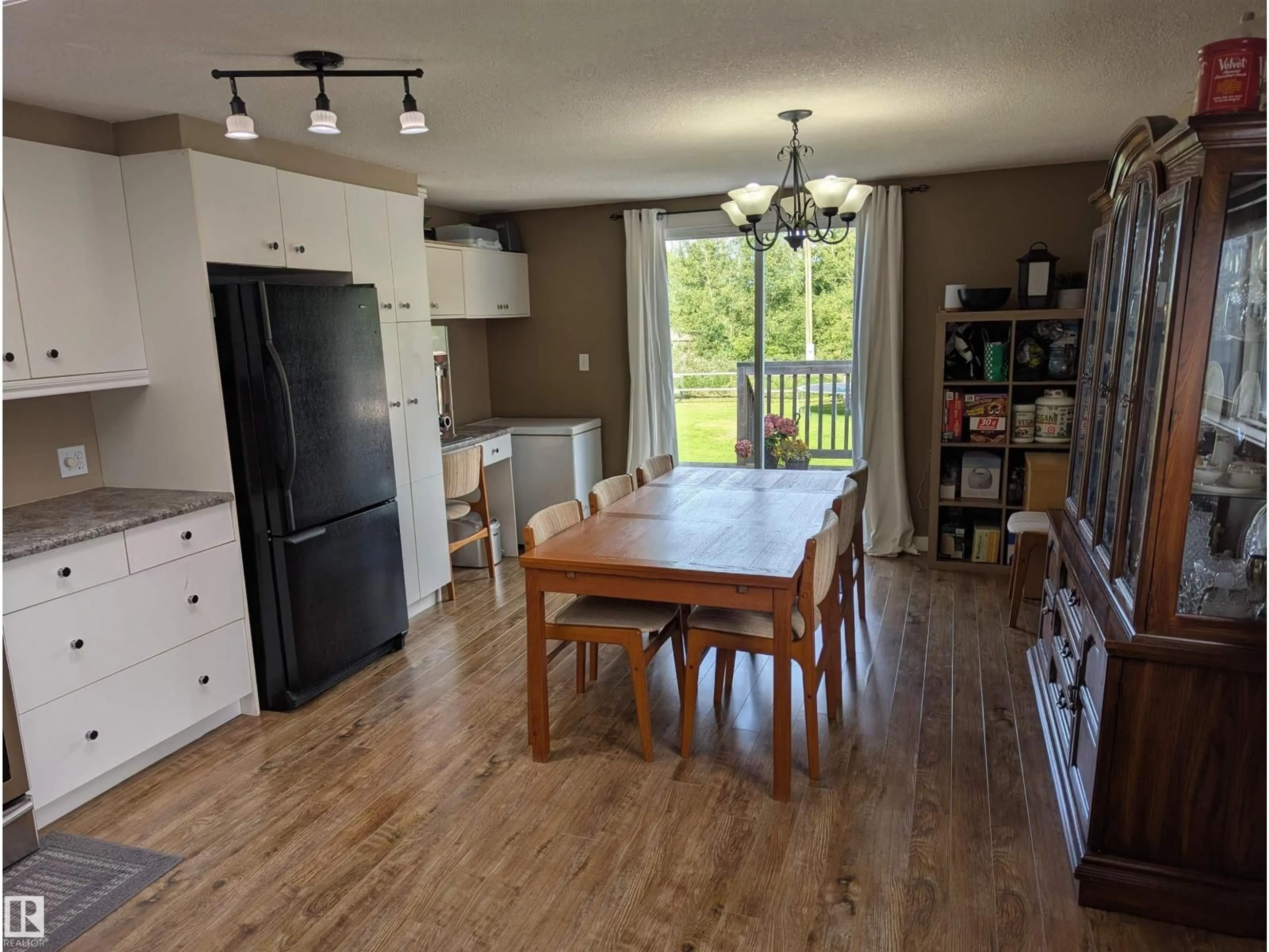 Open concept kitchen, wood/laminate floor for 50312 RANGE ROAD 200, Rural Beaver County Alberta T0B4J2