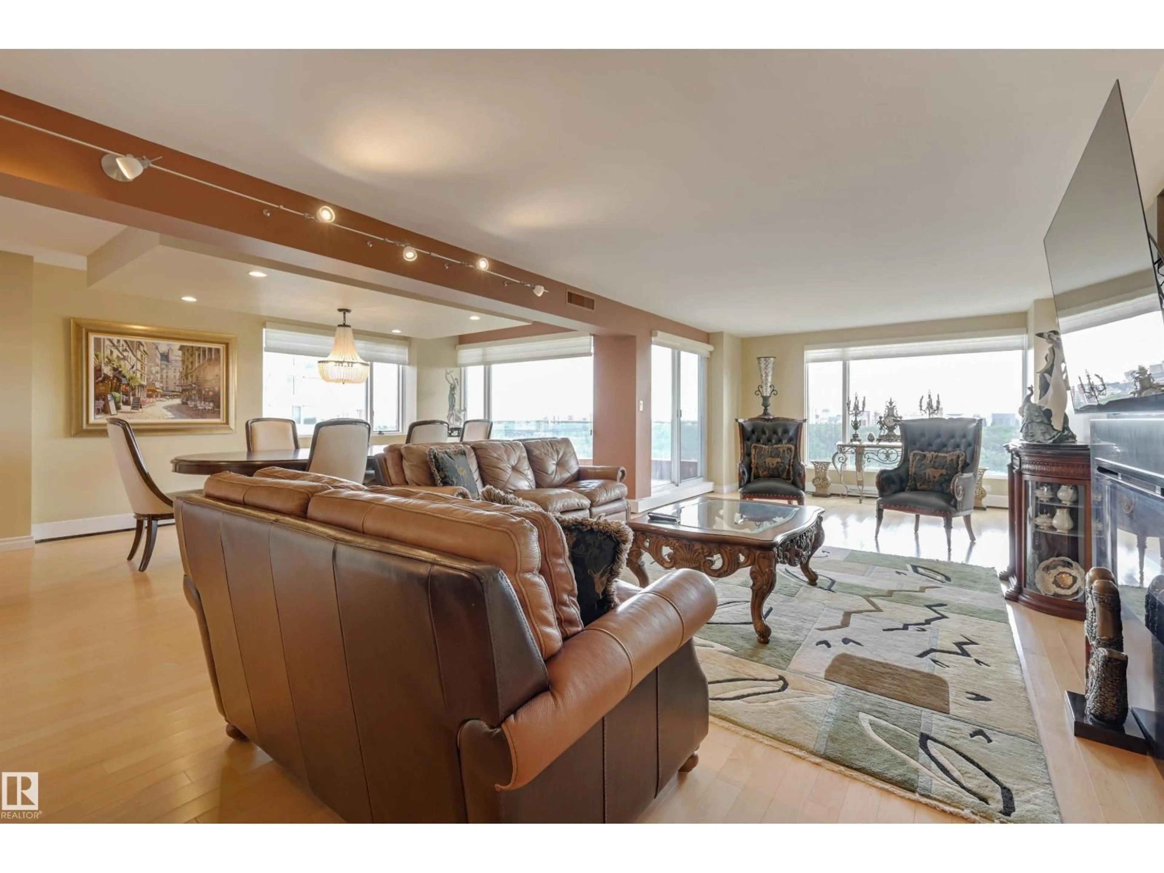 Living room with furniture, unknown for 10010 - 1101 119 ST, Edmonton Alberta T5K1Y8