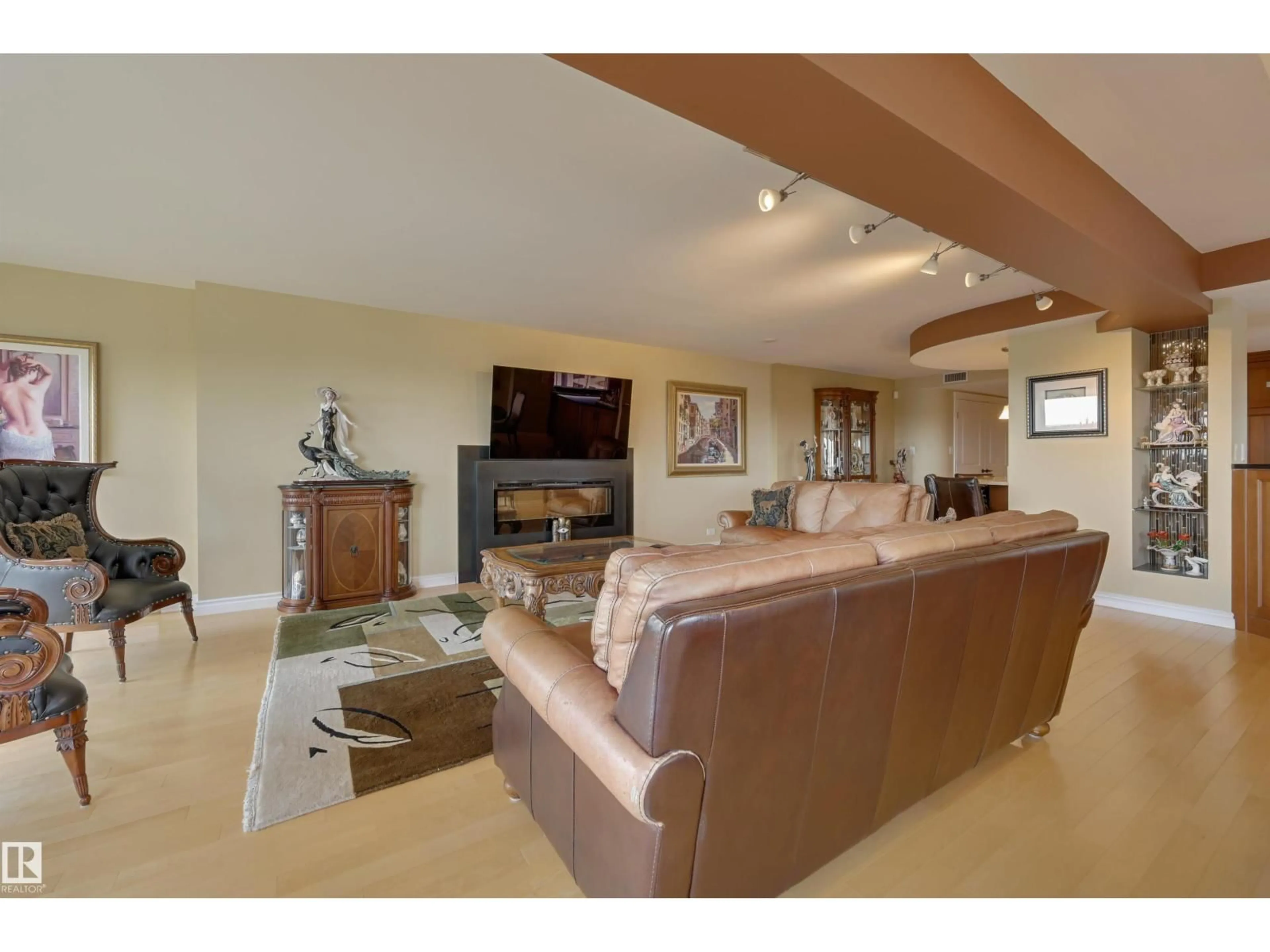 Living room with furniture, unknown for 10010 - 1101 119 ST, Edmonton Alberta T5K1Y8