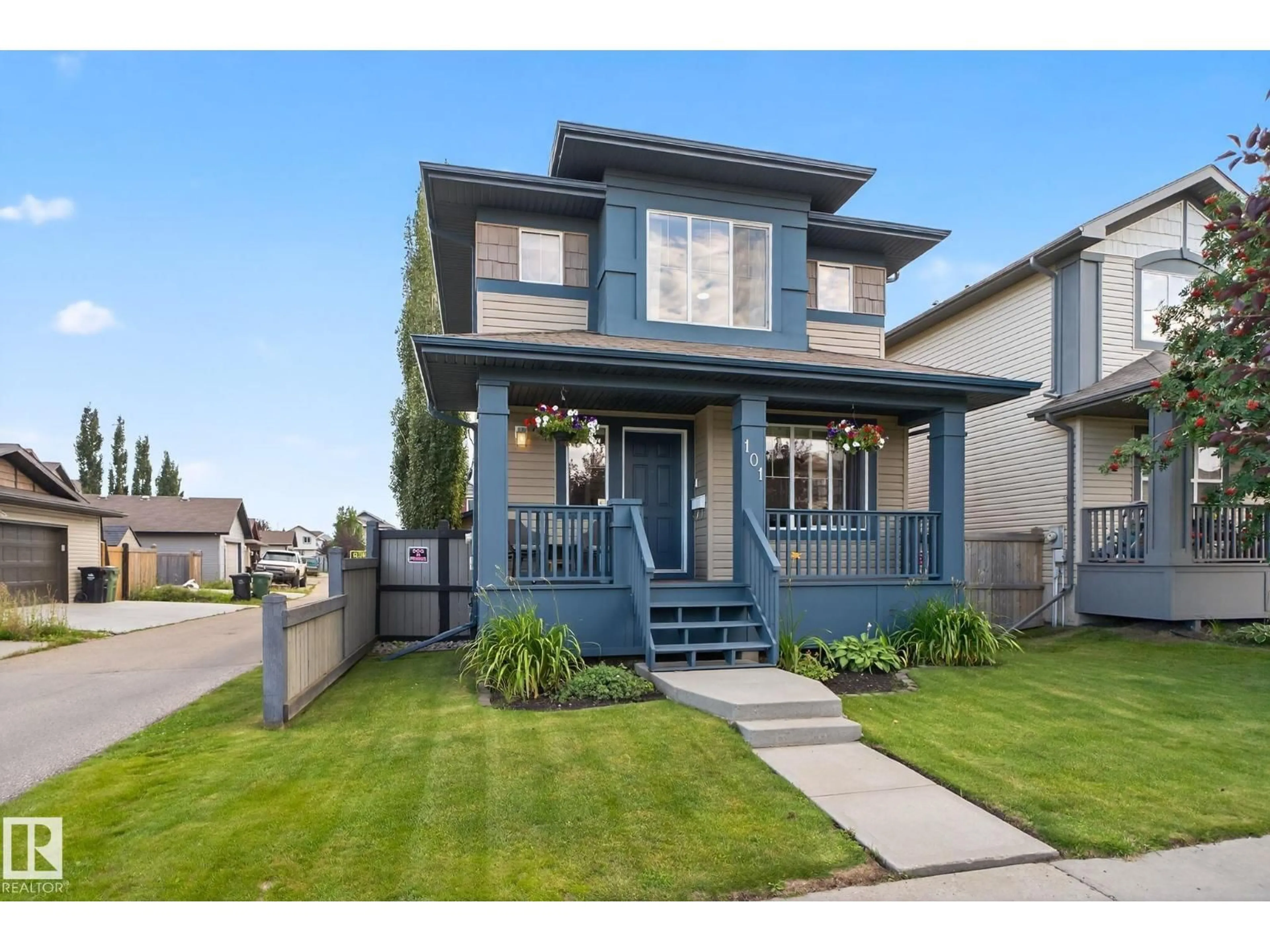 Home with vinyl exterior material, street for 101 KEYSTONE LN, Leduc Alberta T9E0J4