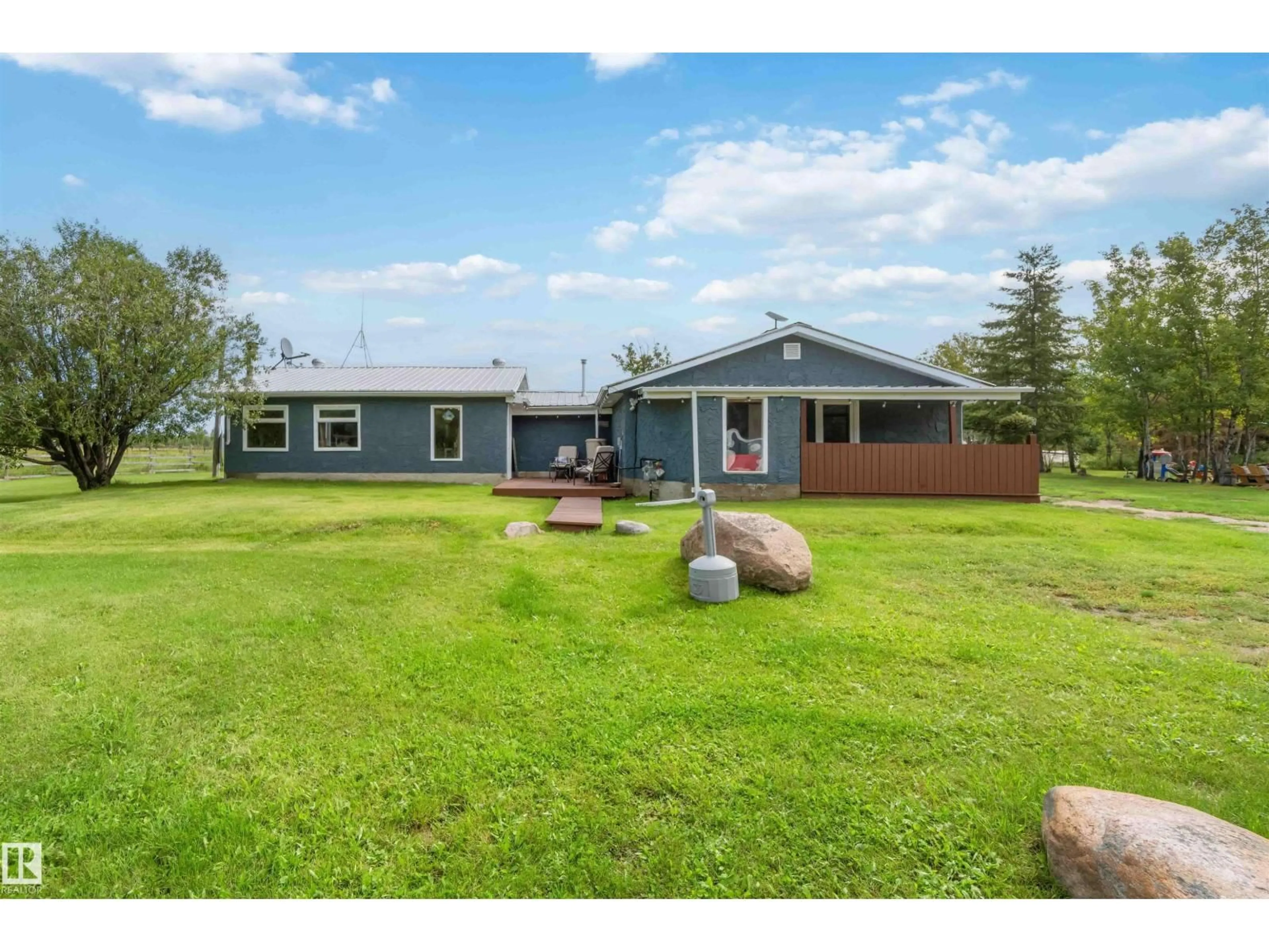 A pic from outside/outdoor area/front of a property/back of a property/a pic from drone, unknown for 19 - 23422 TWP RD 582, Rural Sturgeon County Alberta T0G1L2
