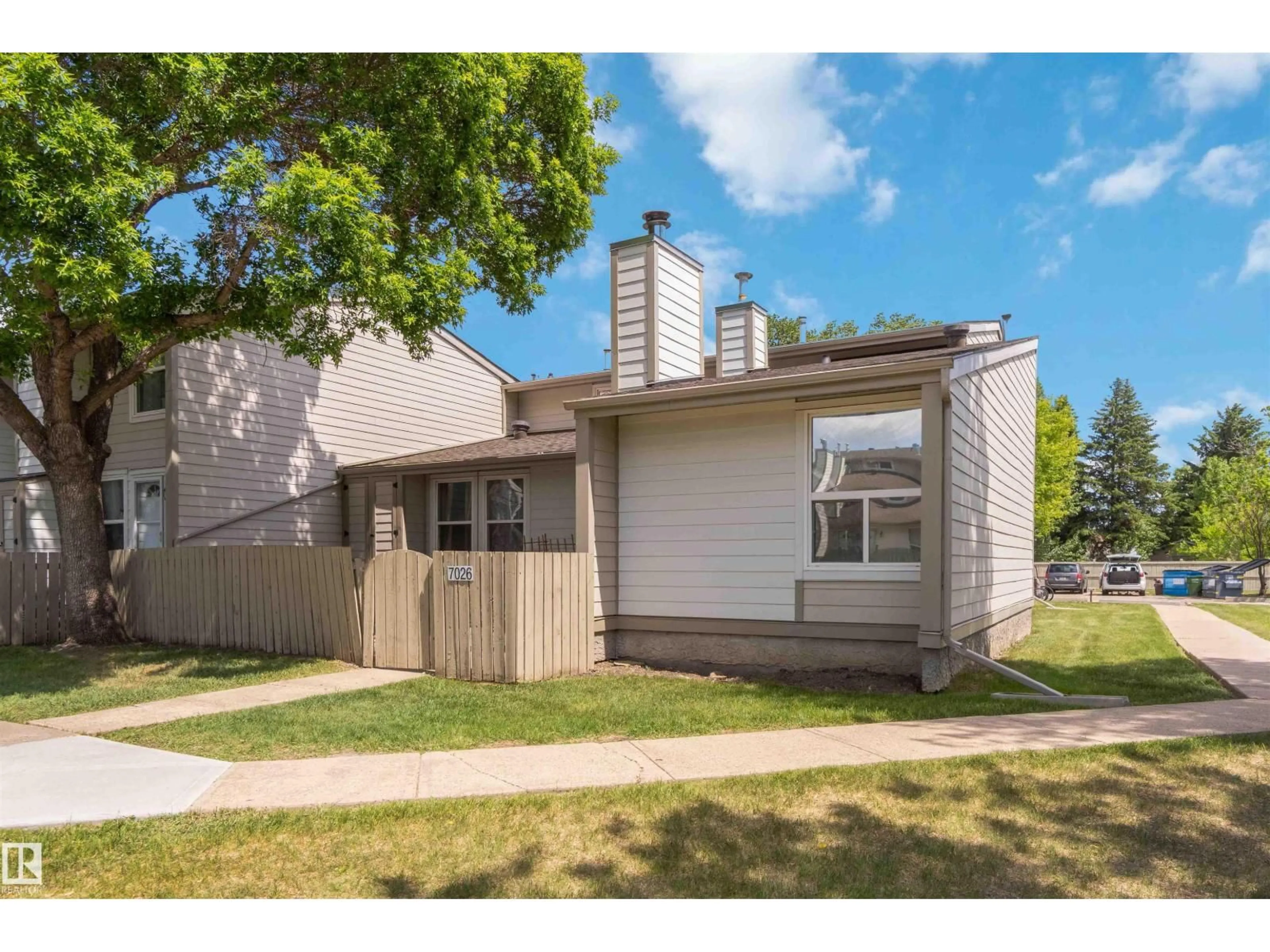 Home with vinyl exterior material, street for 7026 MILLWOODS RD, Edmonton Alberta T6K3M3
