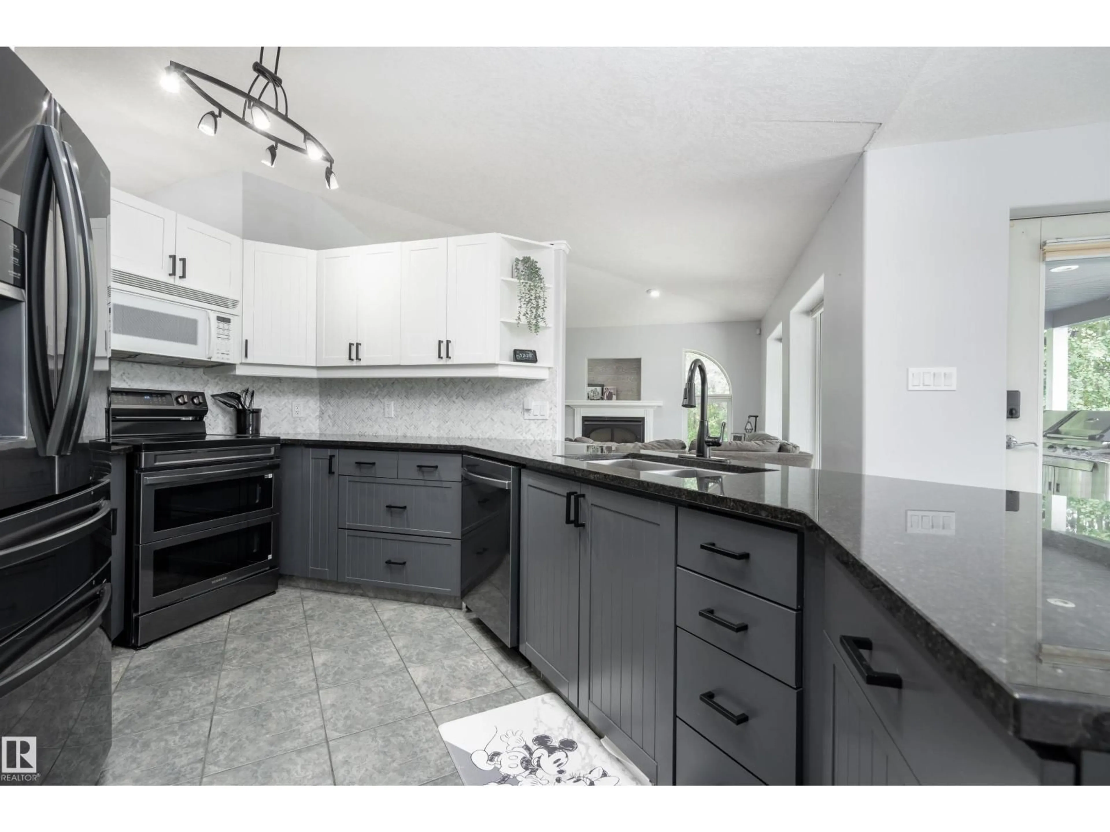 Open concept kitchen, ceramic/tile floor for 21 POWER DR, Rural Lac Ste. Anne County Alberta T0E0A0
