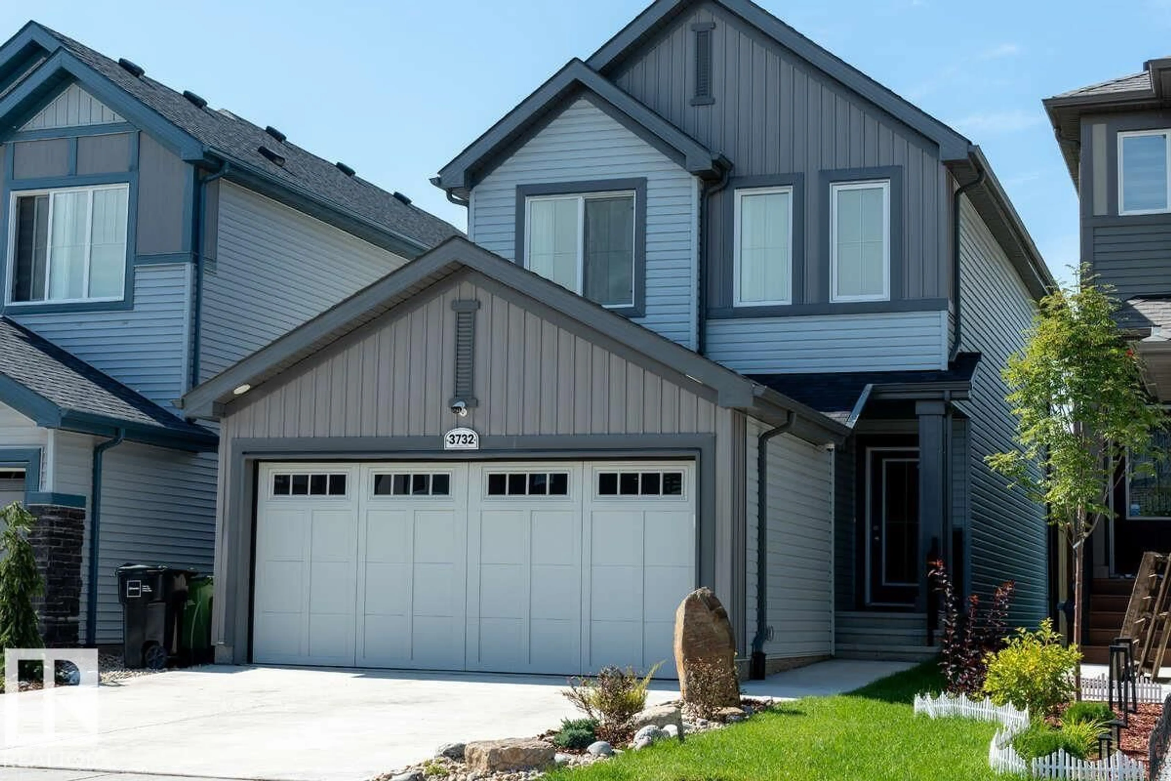 Home with vinyl exterior material, street for NW - 3732 214 ST, Edmonton Alberta T6M1S4