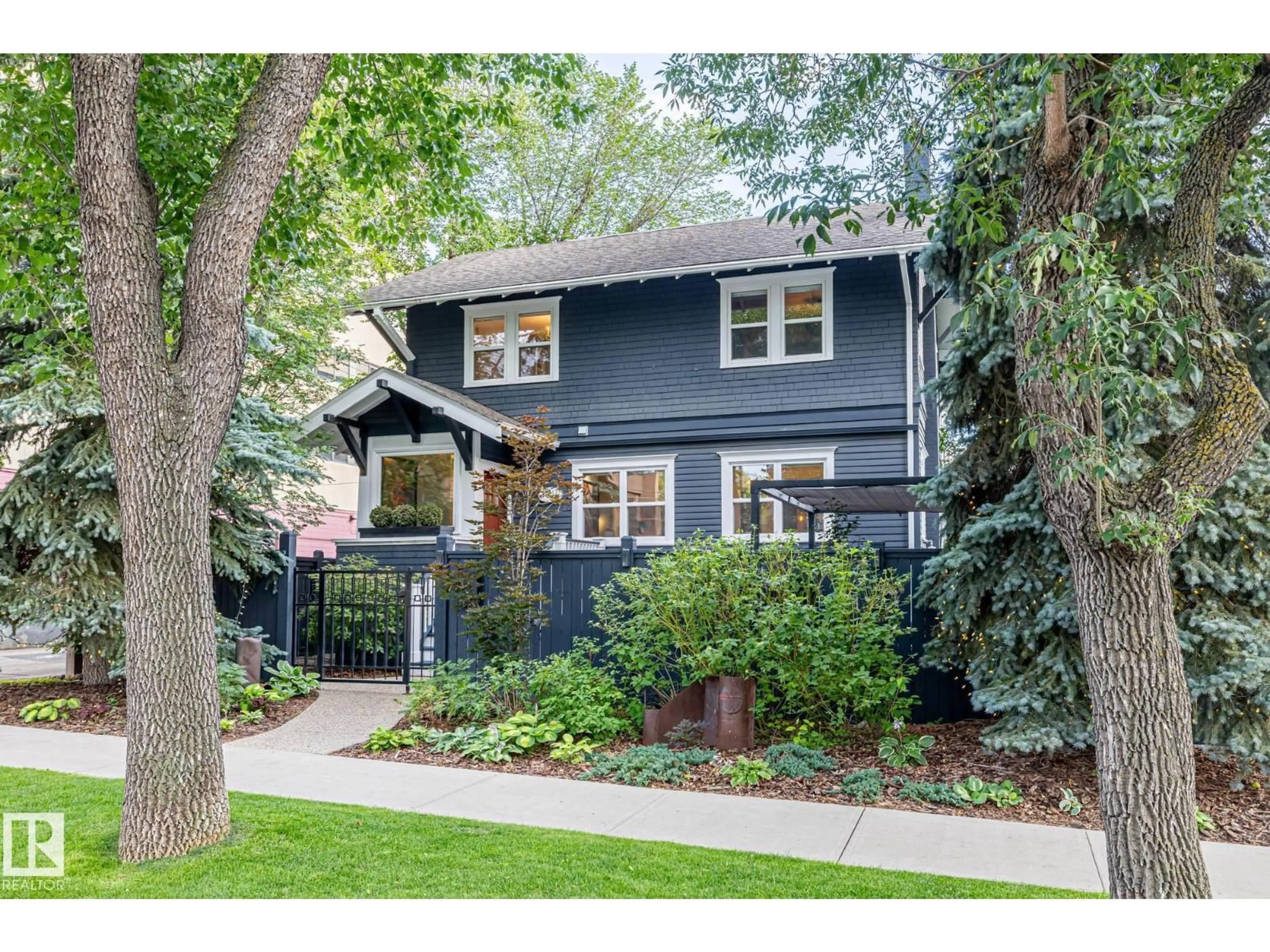 Home with brick exterior material, street for 12417 103 AV, Edmonton Alberta T5N0R4