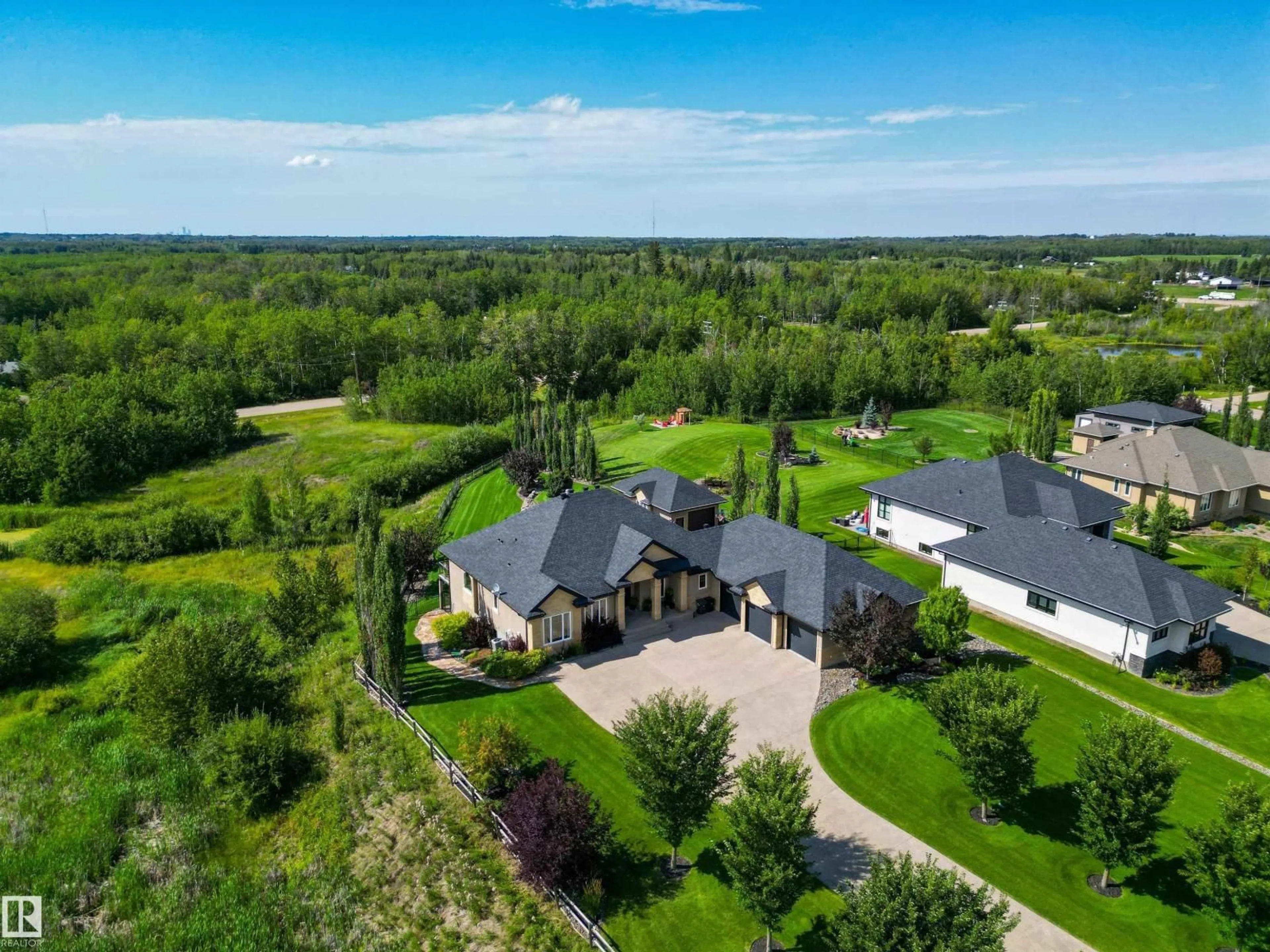 A pic from outside/outdoor area/front of a property/back of a property/a pic from drone, unknown for 52367 - 236 RGE ROAD 223, Rural Strathcona County Alberta T8C1A8