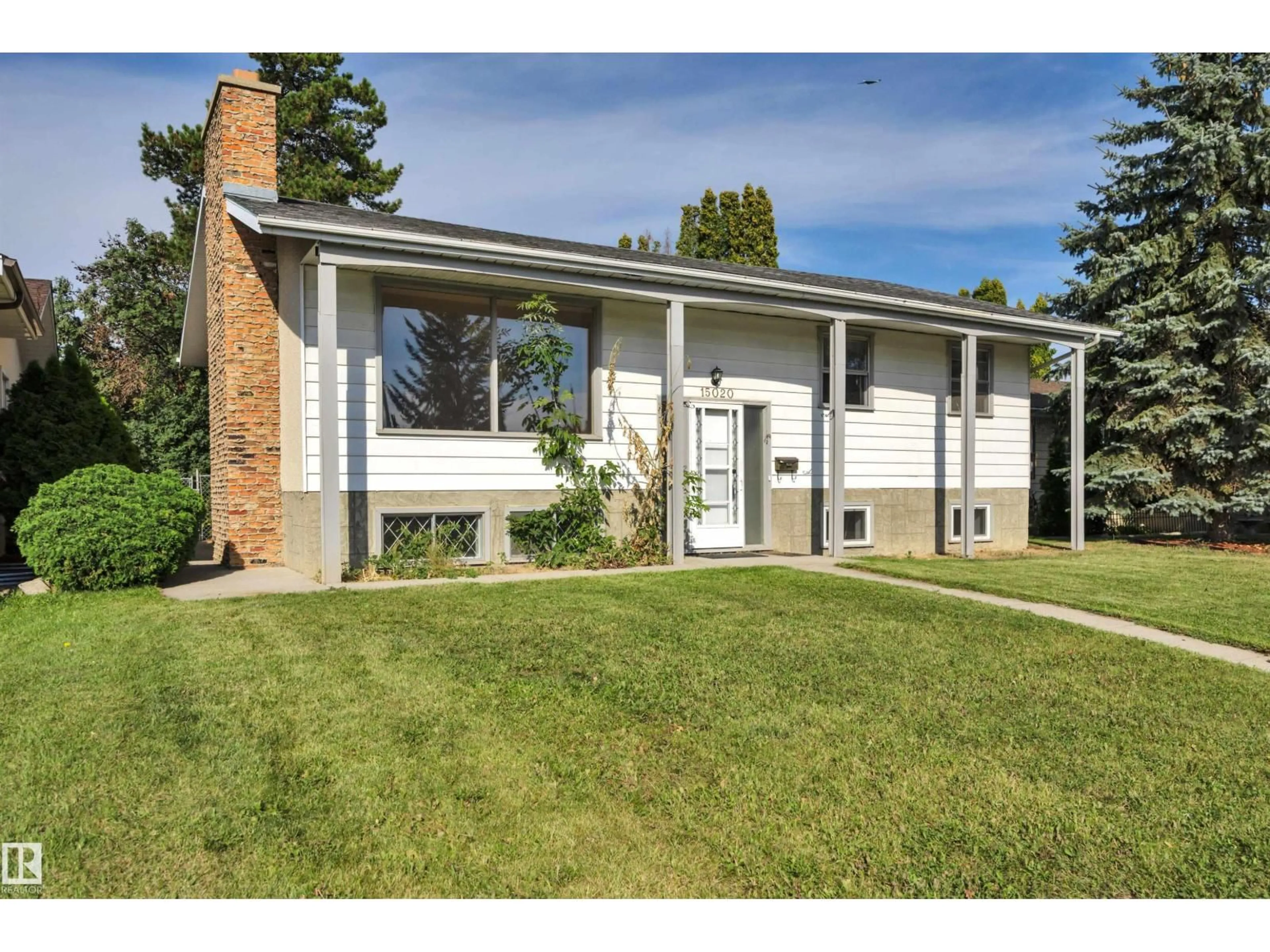 Home with vinyl exterior material, street for NW - 15020 83 ST, Edmonton Alberta T5E5X2