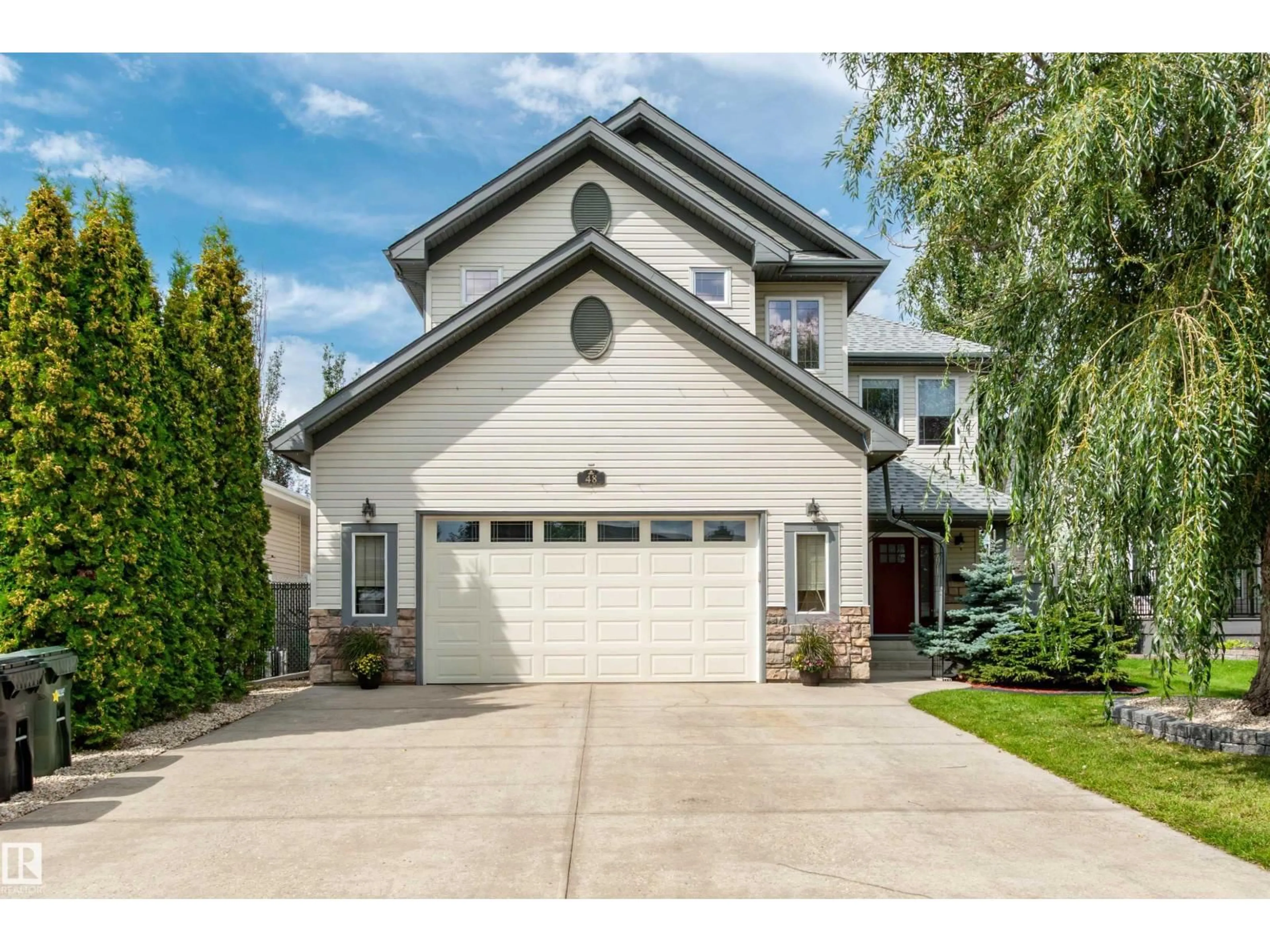 Home with vinyl exterior material, street for 48 HERITAGE LAKE WY, Sherwood Park Alberta T8A6A7