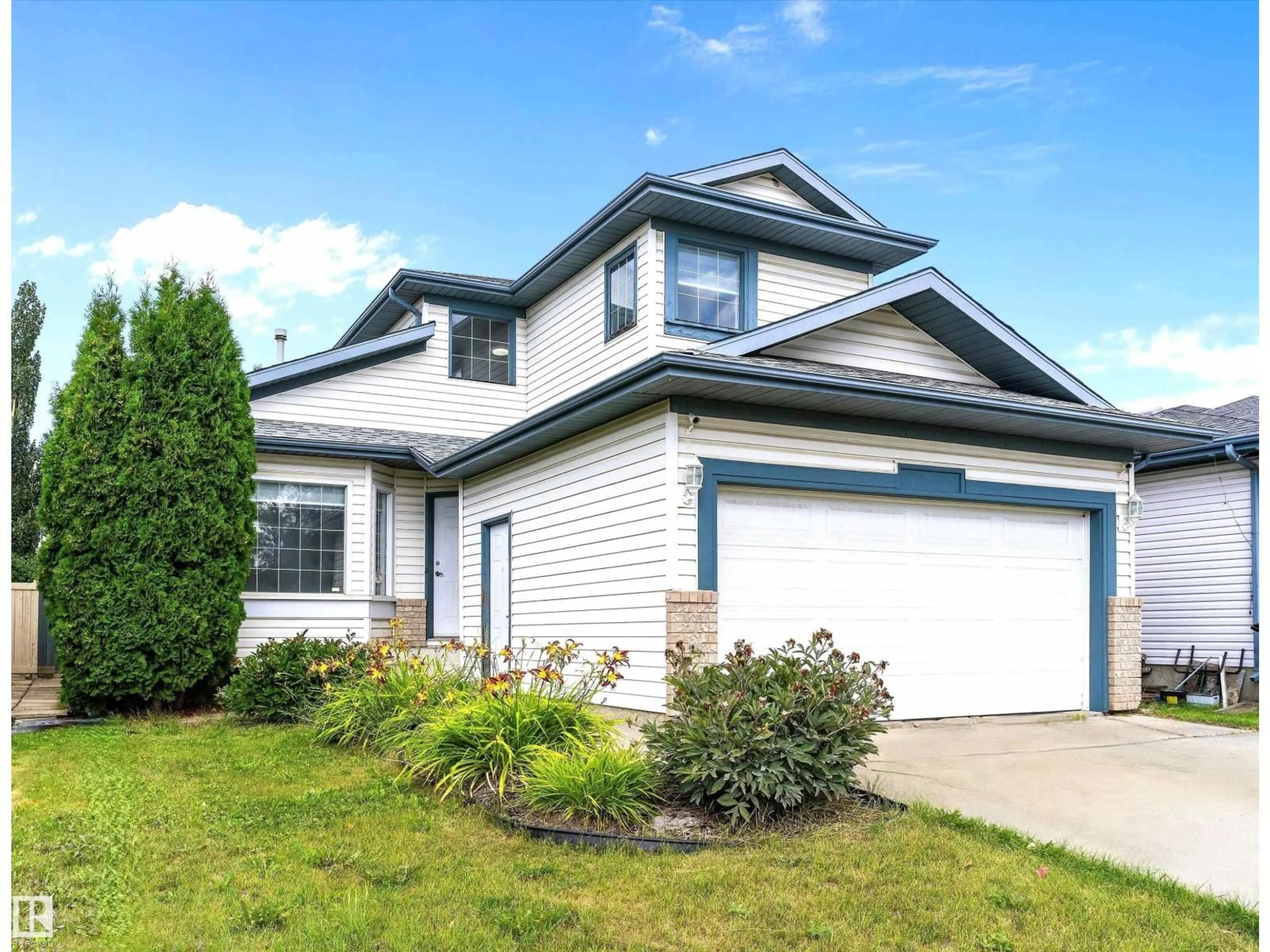 Home with vinyl exterior material, street for 12828 144 AV, Edmonton Alberta T6V1C7