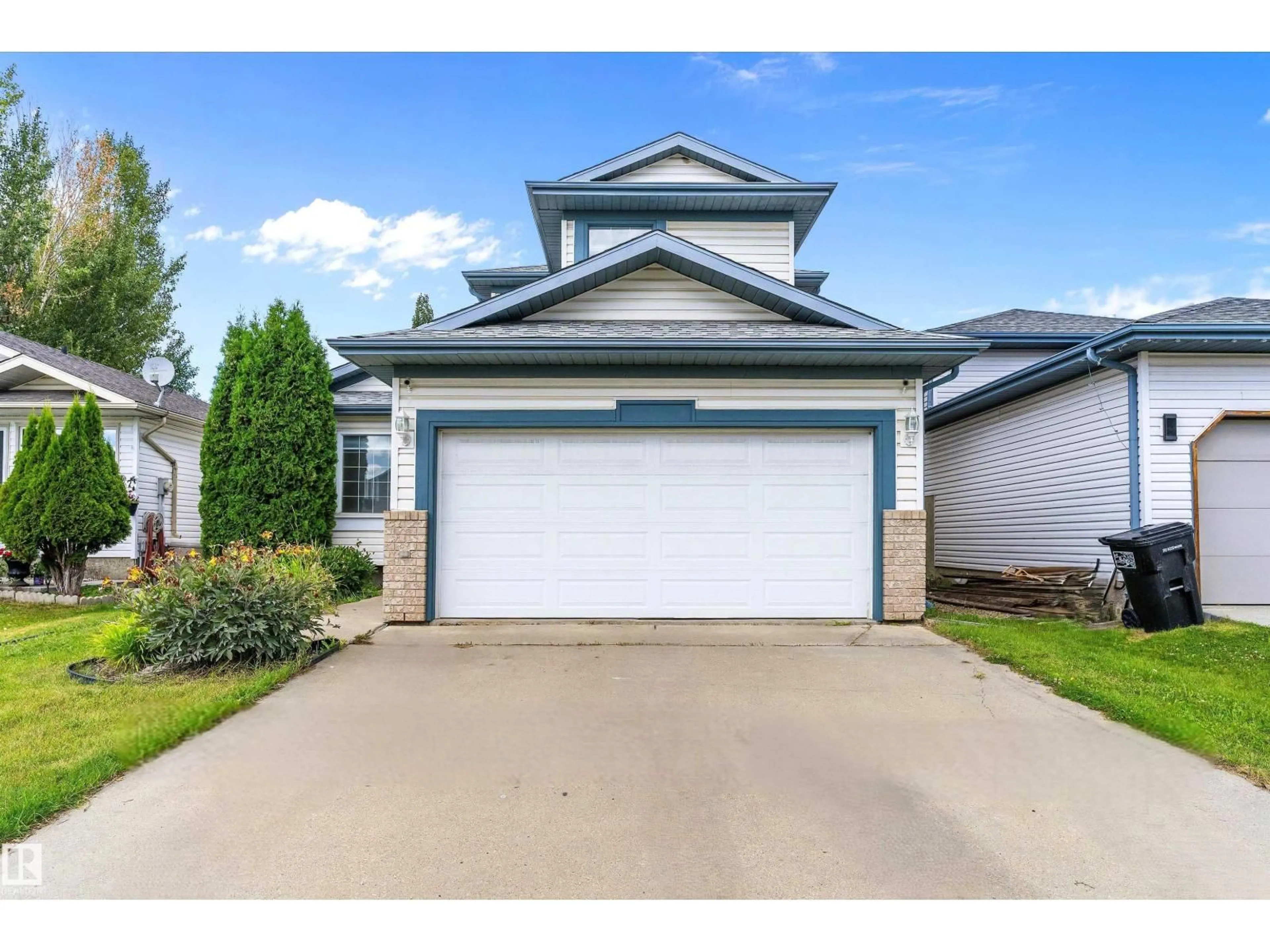 Home with vinyl exterior material, street for 12828 144 AV, Edmonton Alberta T6V1C7