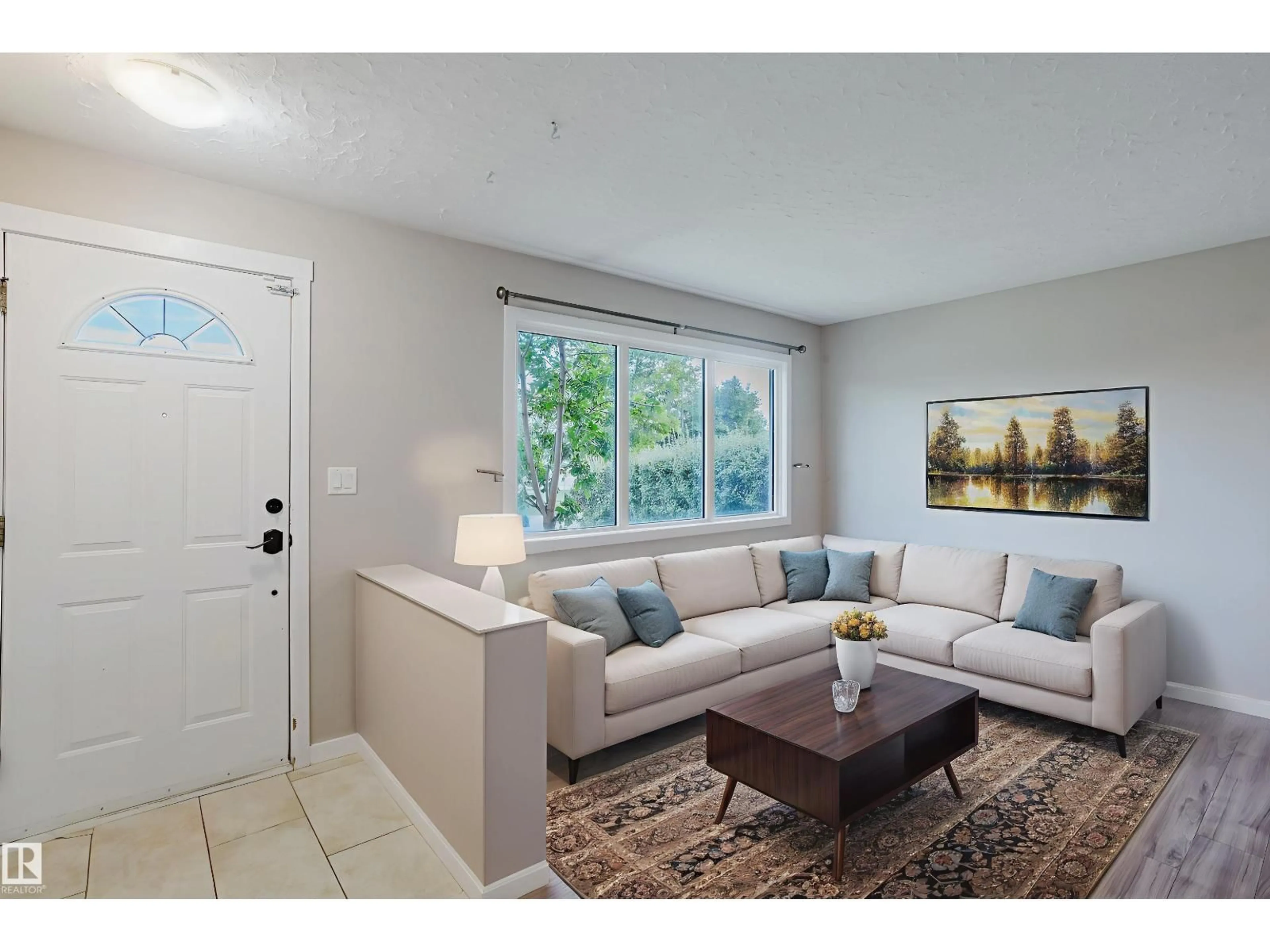 Living room with furniture, unknown for 13808 135 AV NW, Edmonton Alberta T5L3Y8