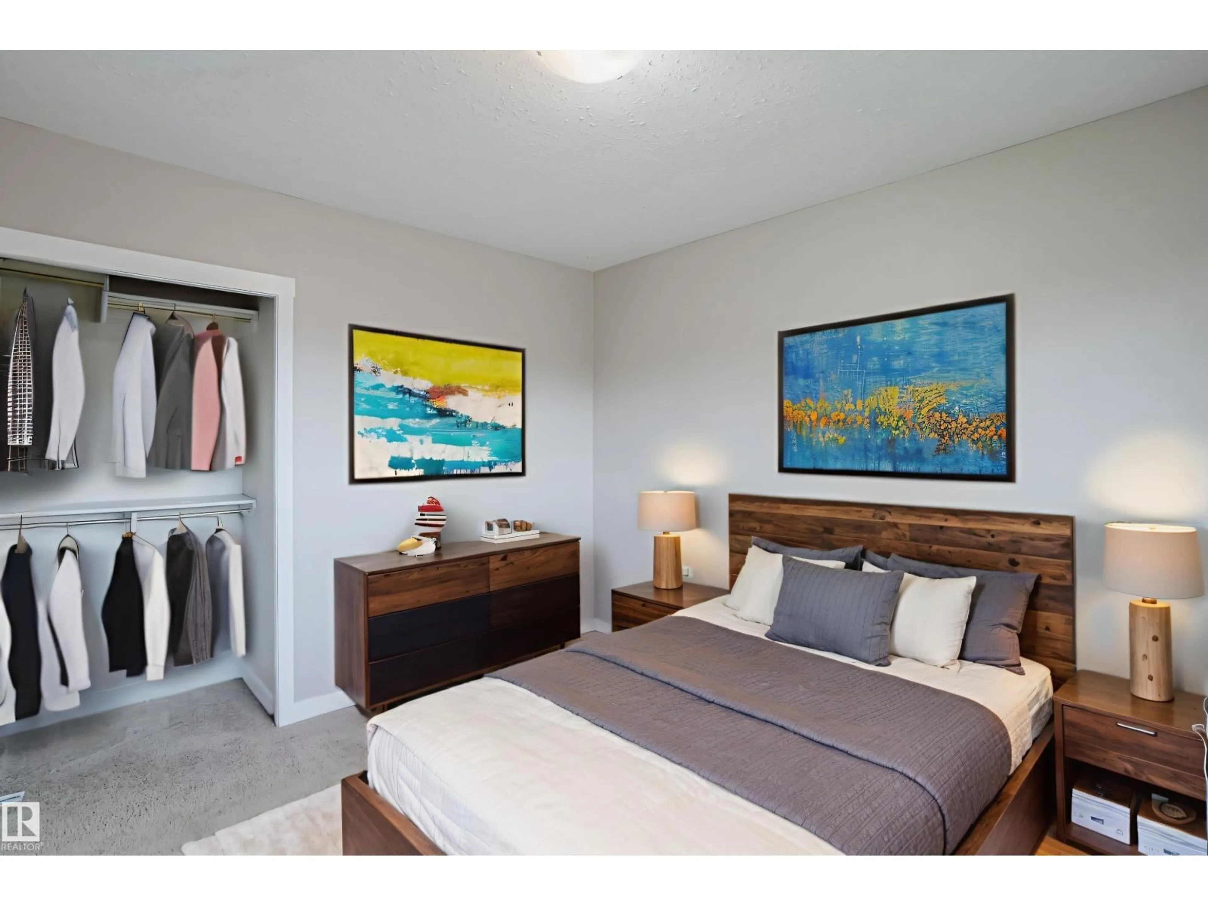 Bedroom with bed, wood/laminate floor for 13808 135 AV NW, Edmonton Alberta T5L3Y8