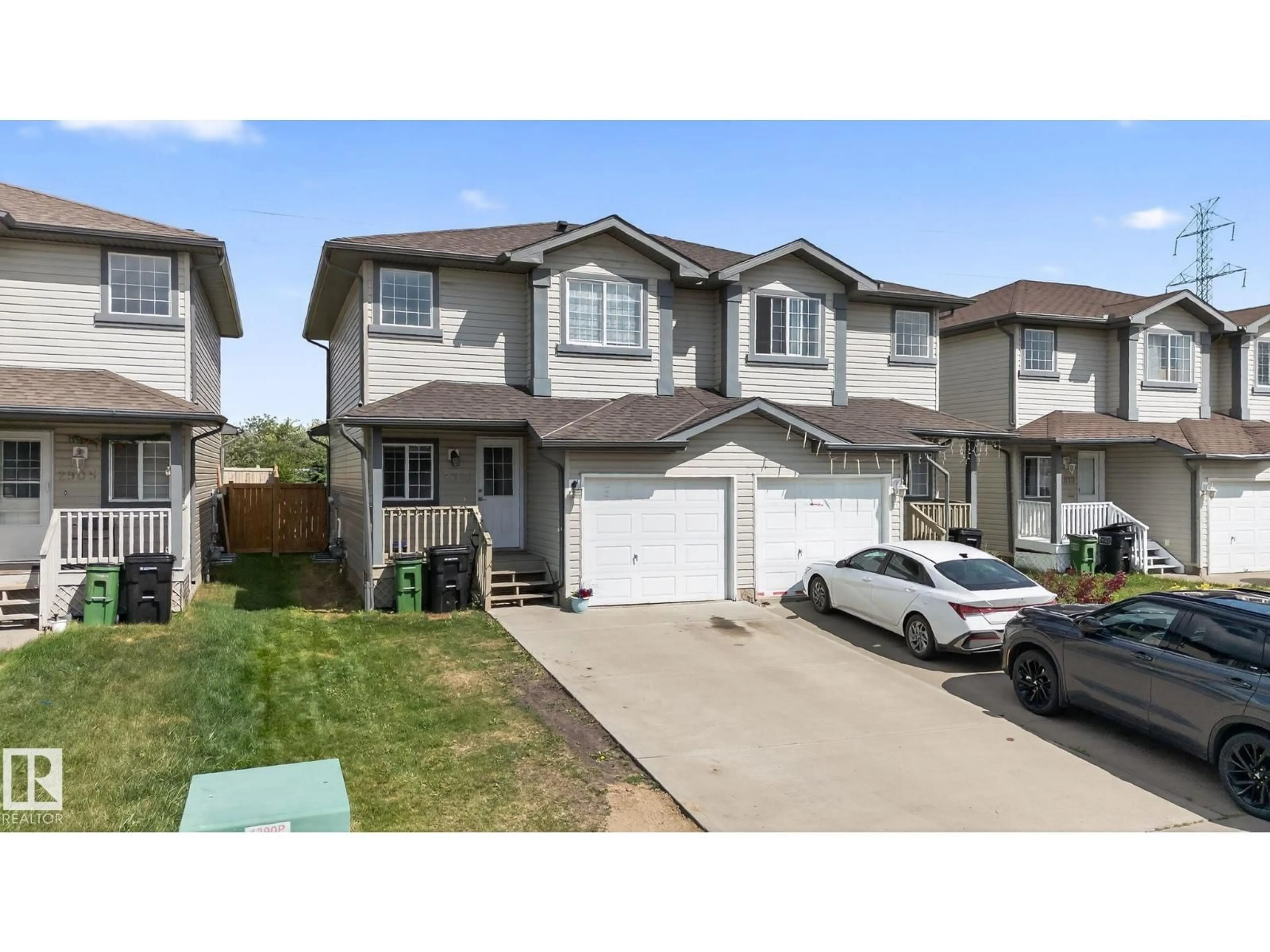 Home with vinyl exterior material, street for 2903 30 ST, Edmonton Alberta T6T1V3