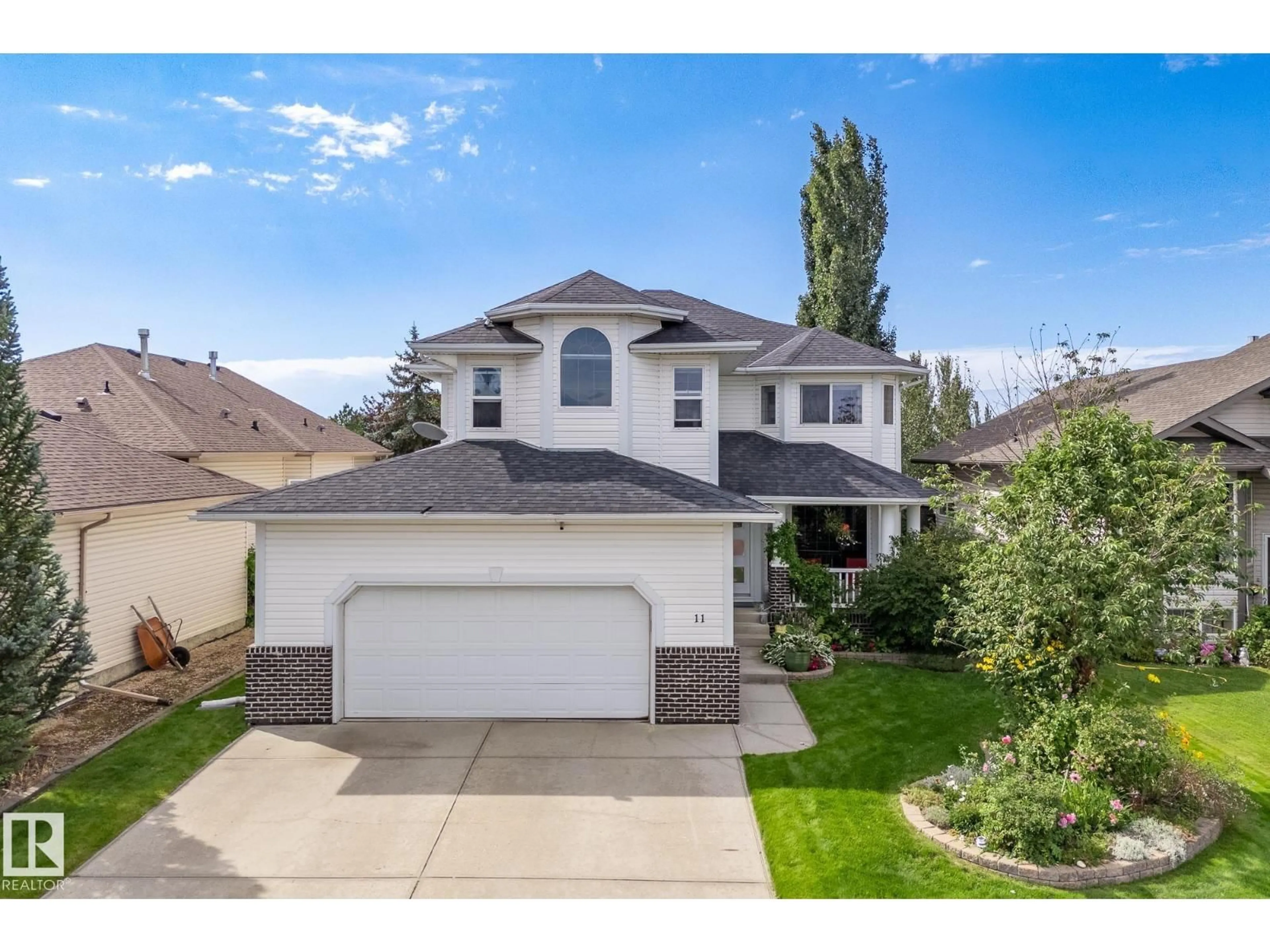 A pic from outside/outdoor area/front of a property/back of a property/a pic from drone, street for 11 LINKSIDE WY, Spruce Grove Alberta T7X4H7