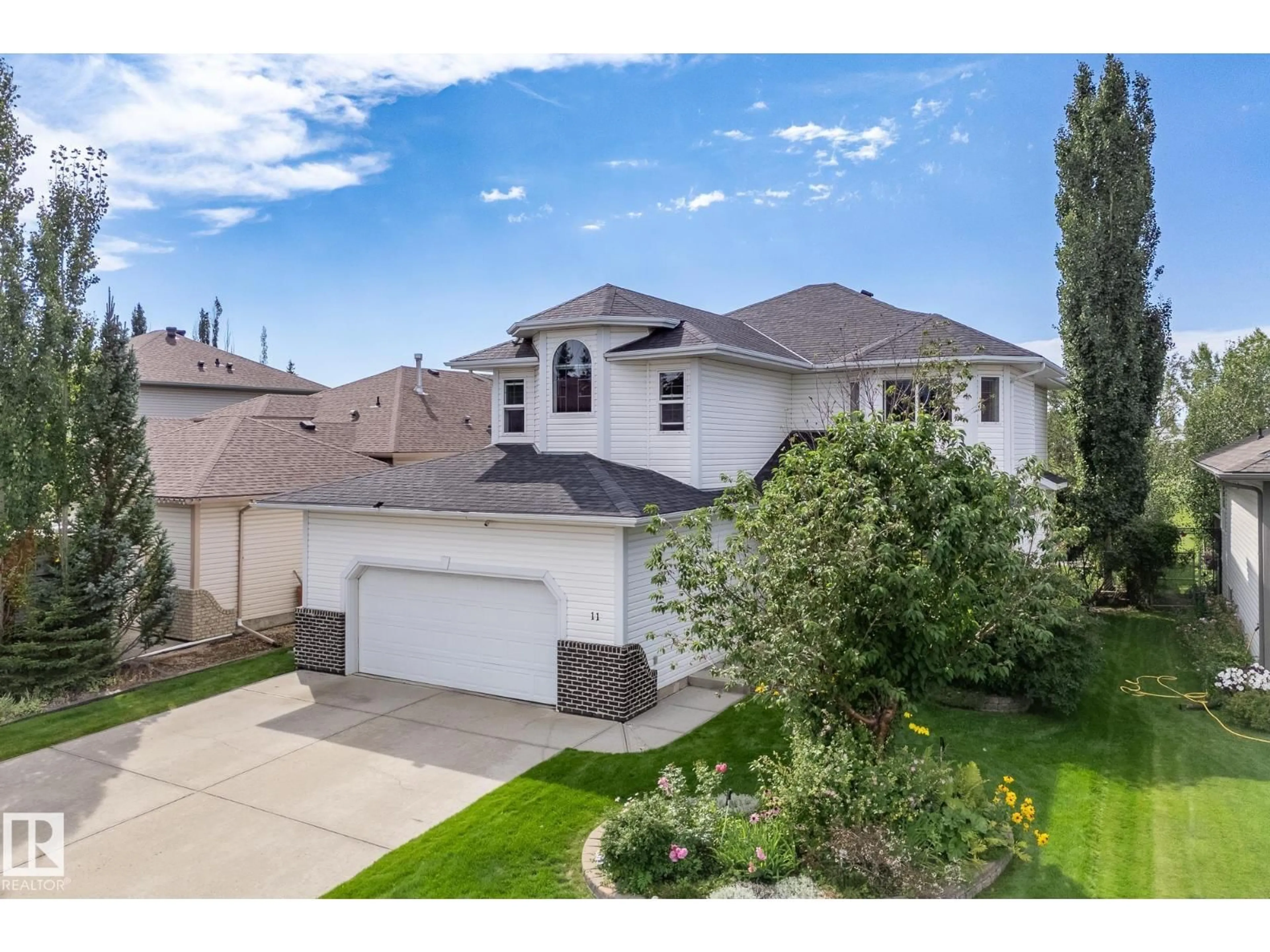 A pic from outside/outdoor area/front of a property/back of a property/a pic from drone, street for 11 LINKSIDE WY, Spruce Grove Alberta T7X4H7