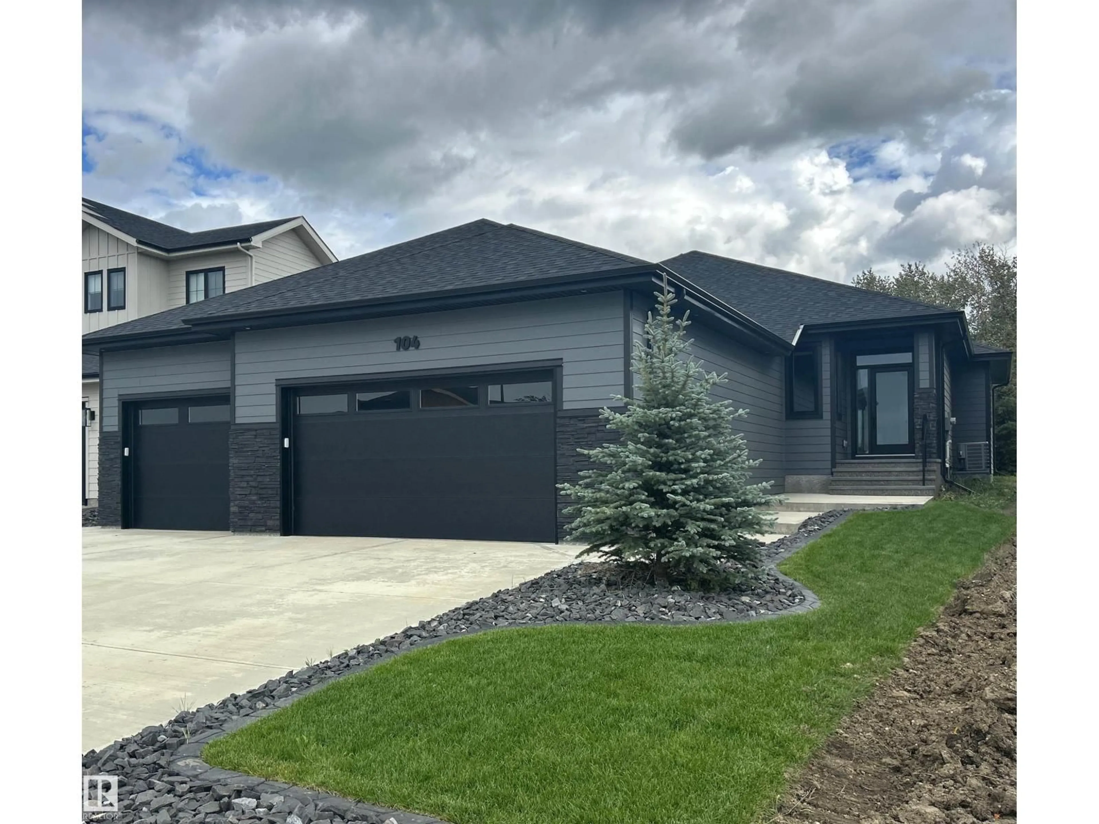 Home with vinyl exterior material, street for 104 HARVEST CR, Ardrossan Alberta T8E0B5