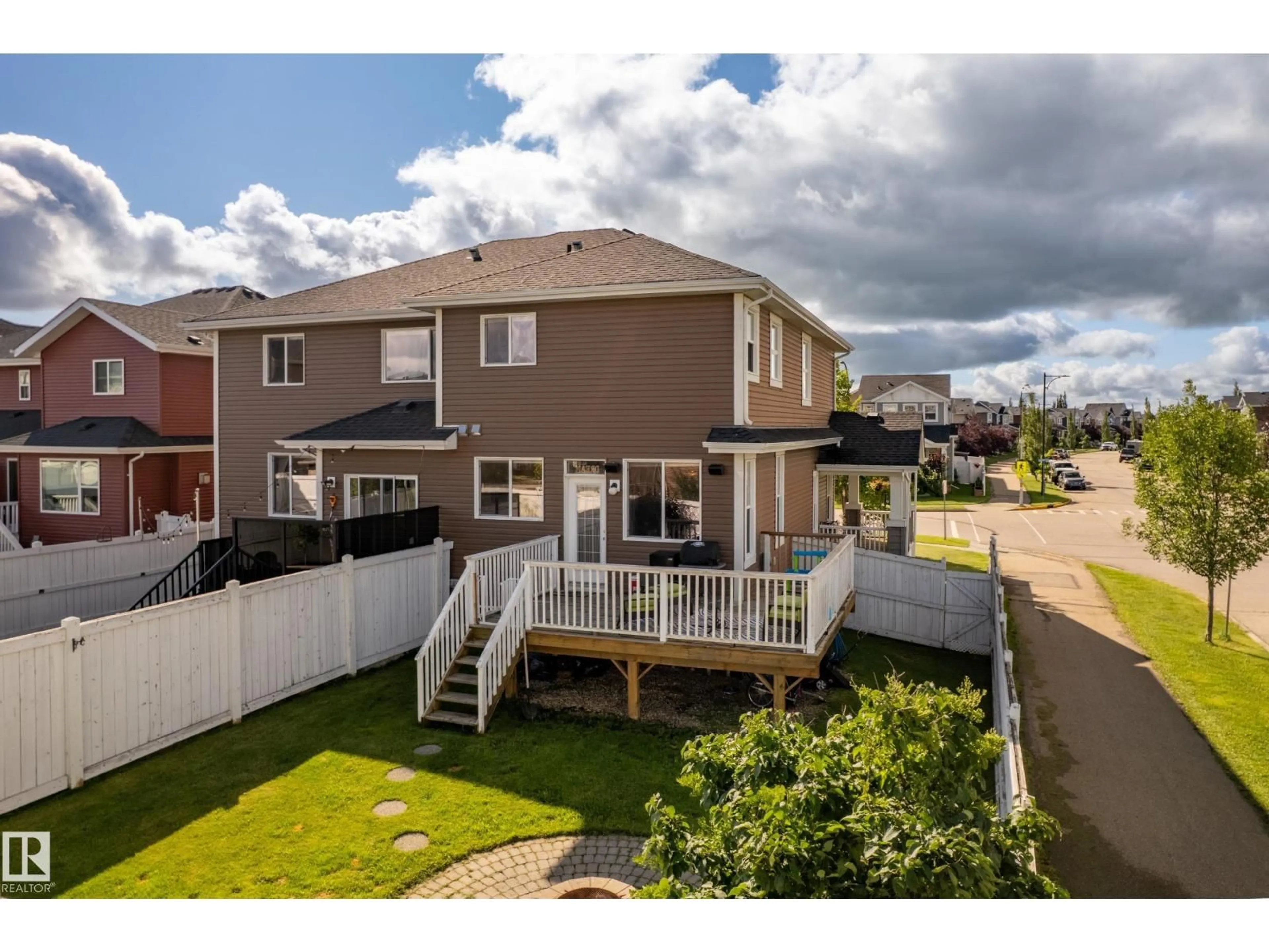 A pic from outside/outdoor area/front of a property/back of a property/a pic from drone, unknown for 425 SIMMONDS WY, Leduc Alberta T9E0E6