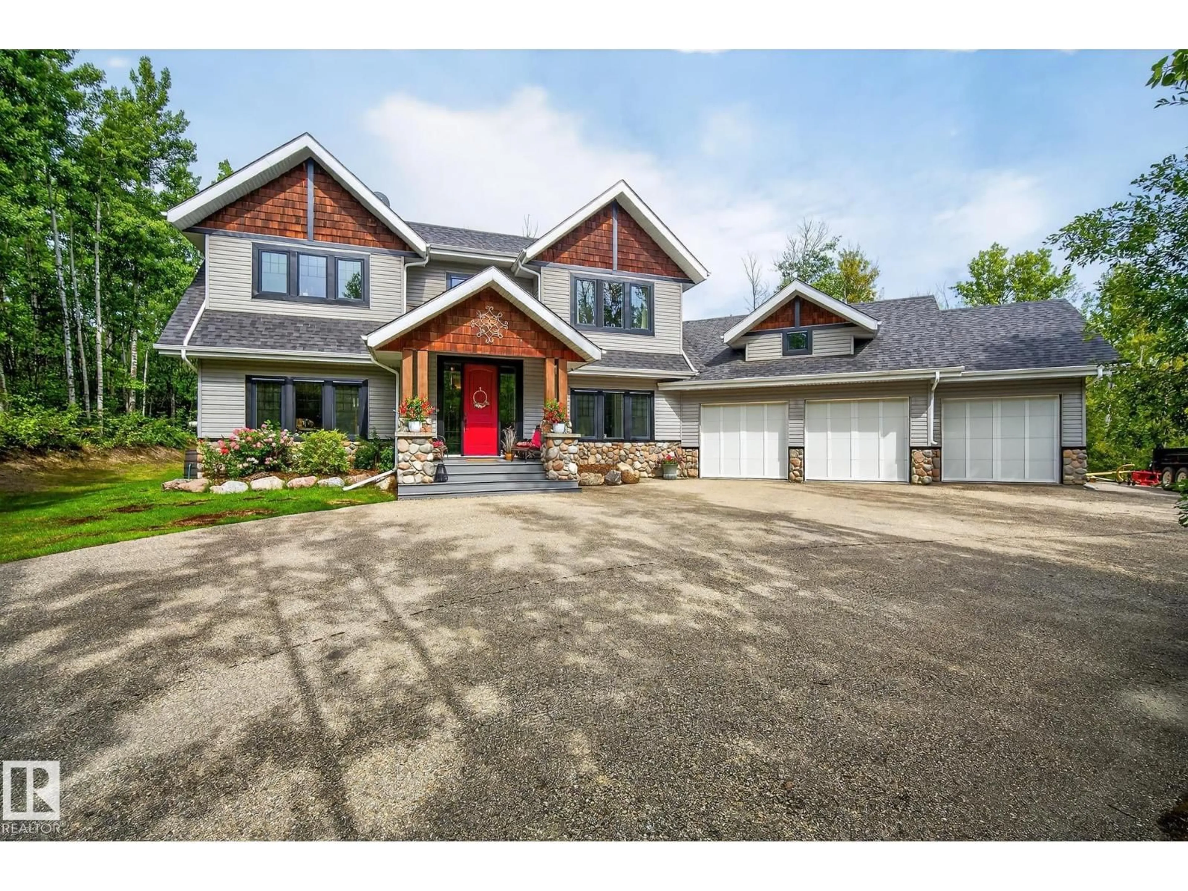 Home with brick exterior material, street for 54129 - 10 RGE ROAD 275, Rural Parkland County Alberta T7X3S4