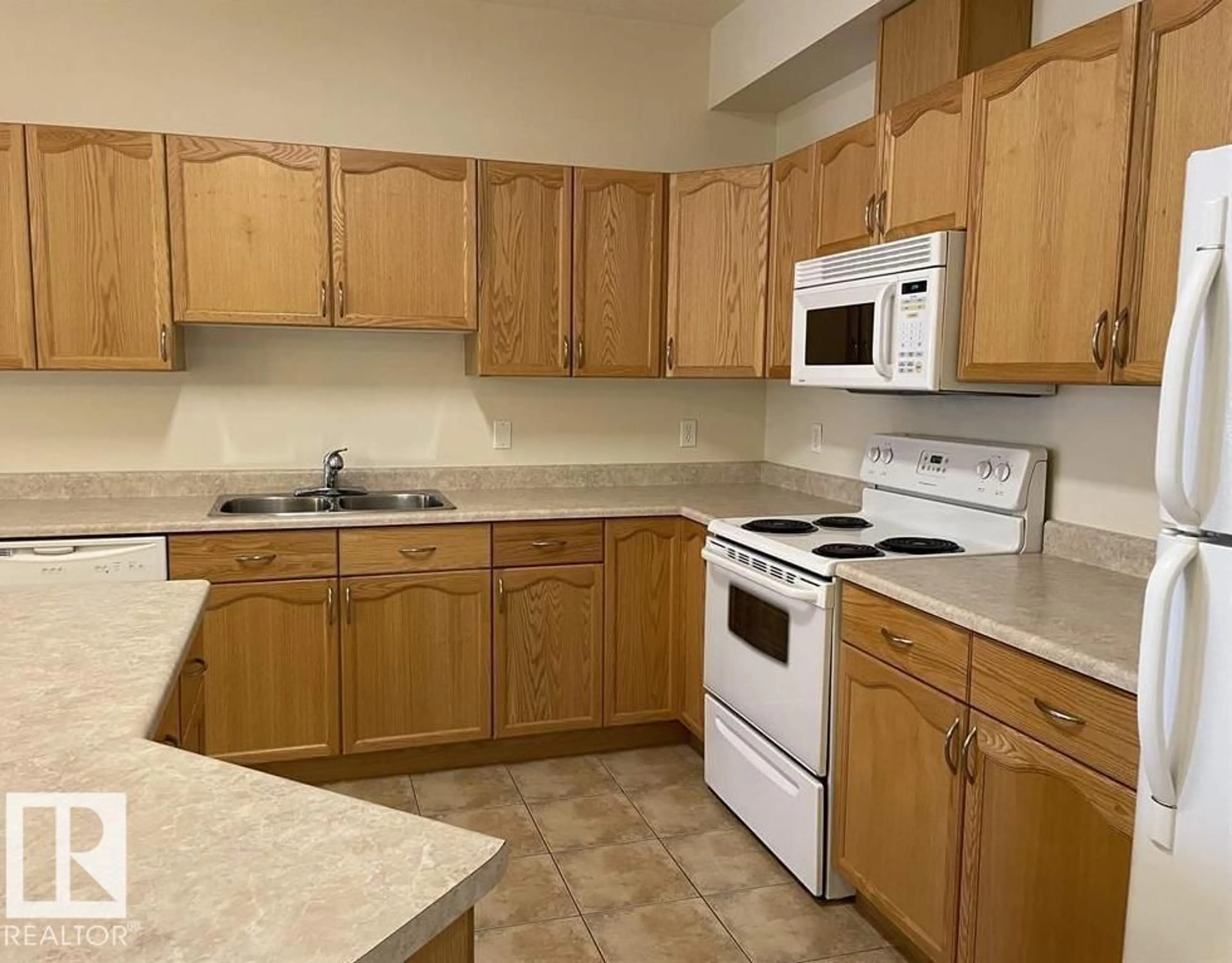 Standard kitchen, unknown for #322 - 4304 139 AV, Edmonton Alberta T5Y0H6