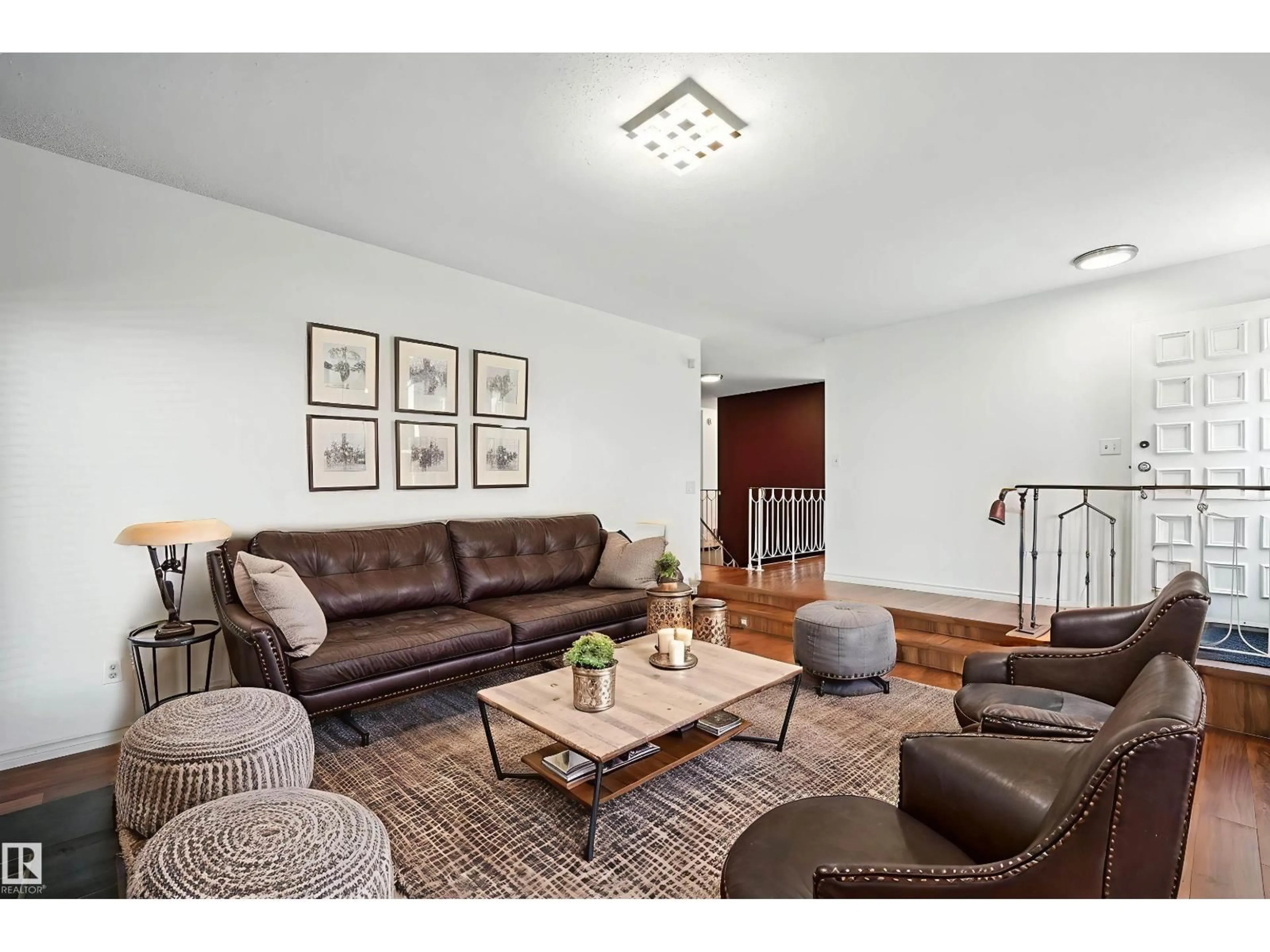 Living room with furniture, unknown for 11403 145 AV, Edmonton Alberta T5X1L9