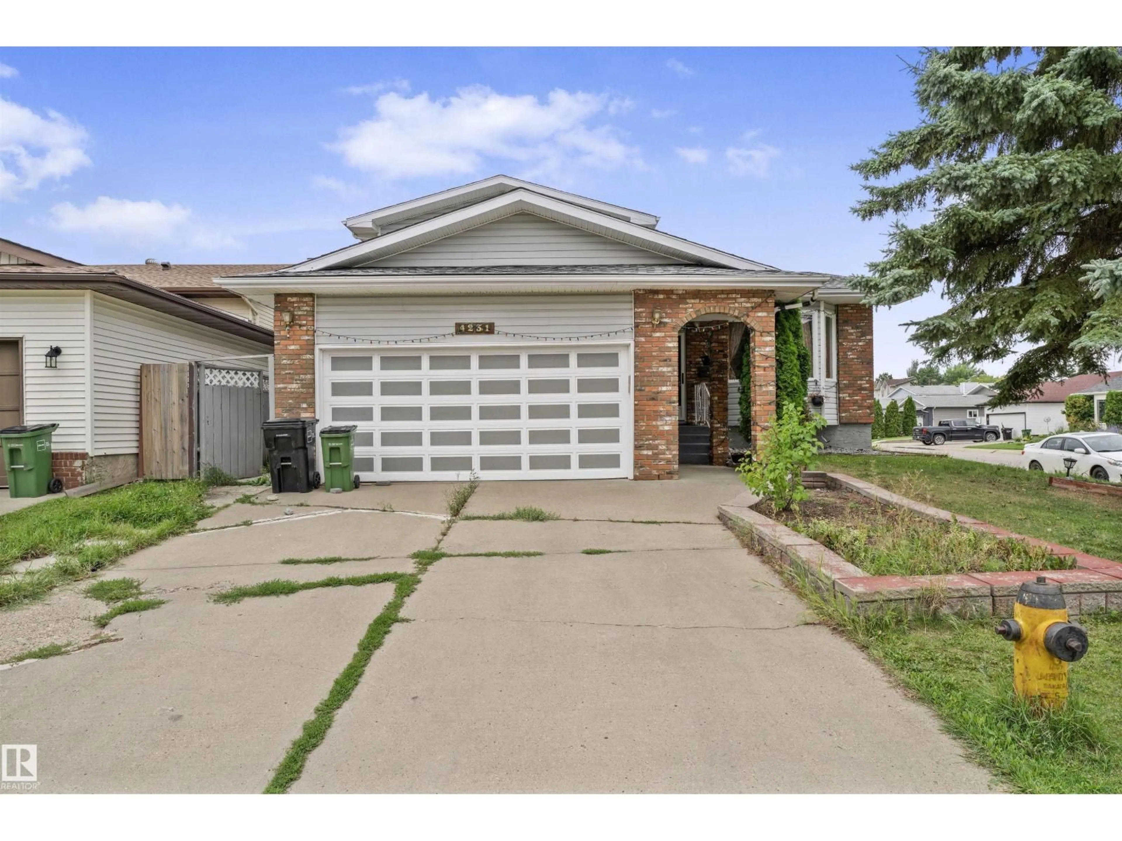 Home with brick exterior material, street for 4231 32 AV, Edmonton Alberta T6L3W5