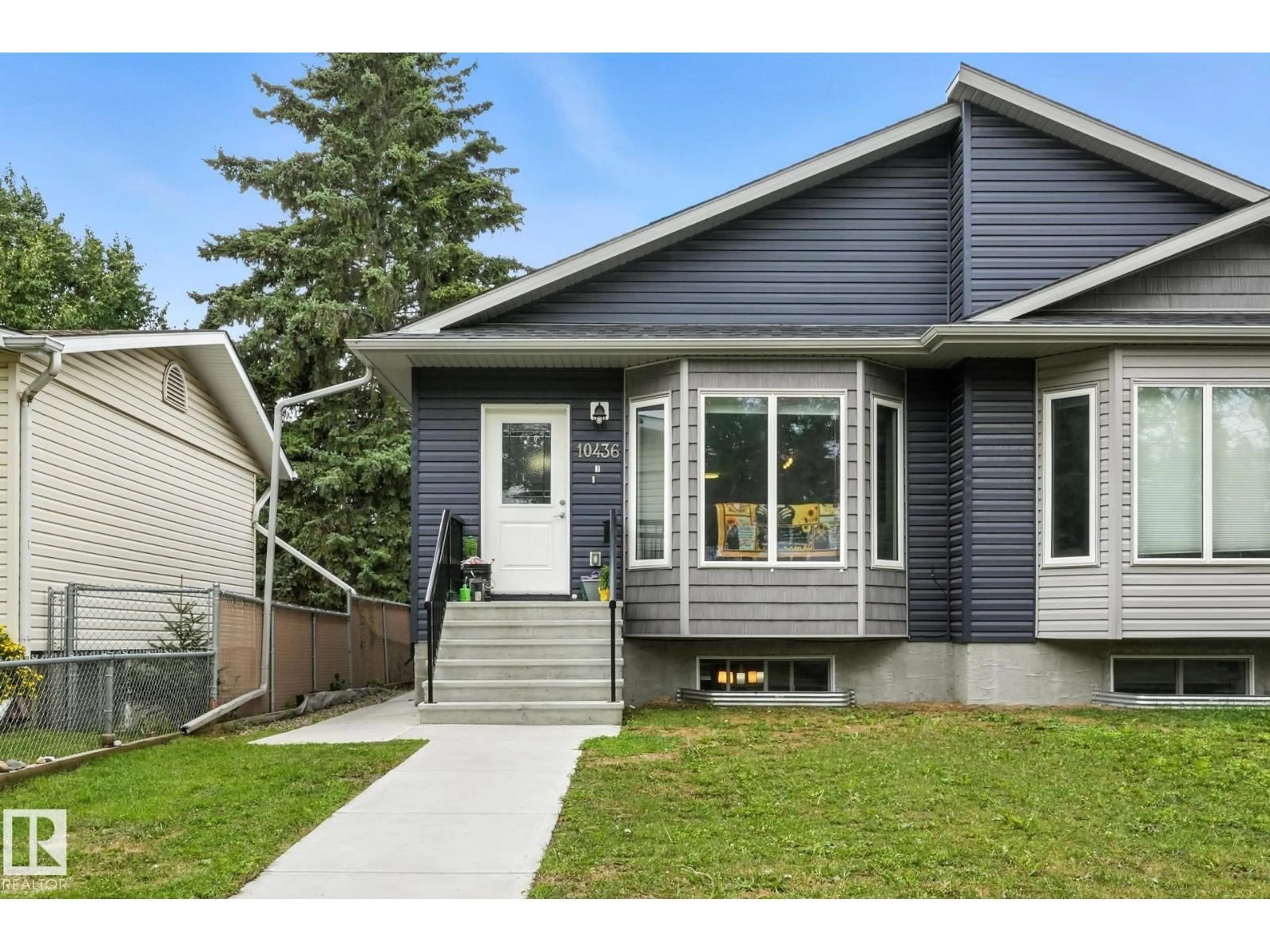 Home with vinyl exterior material, street for NW - 10436 154 ST, Edmonton Alberta T5P2H8