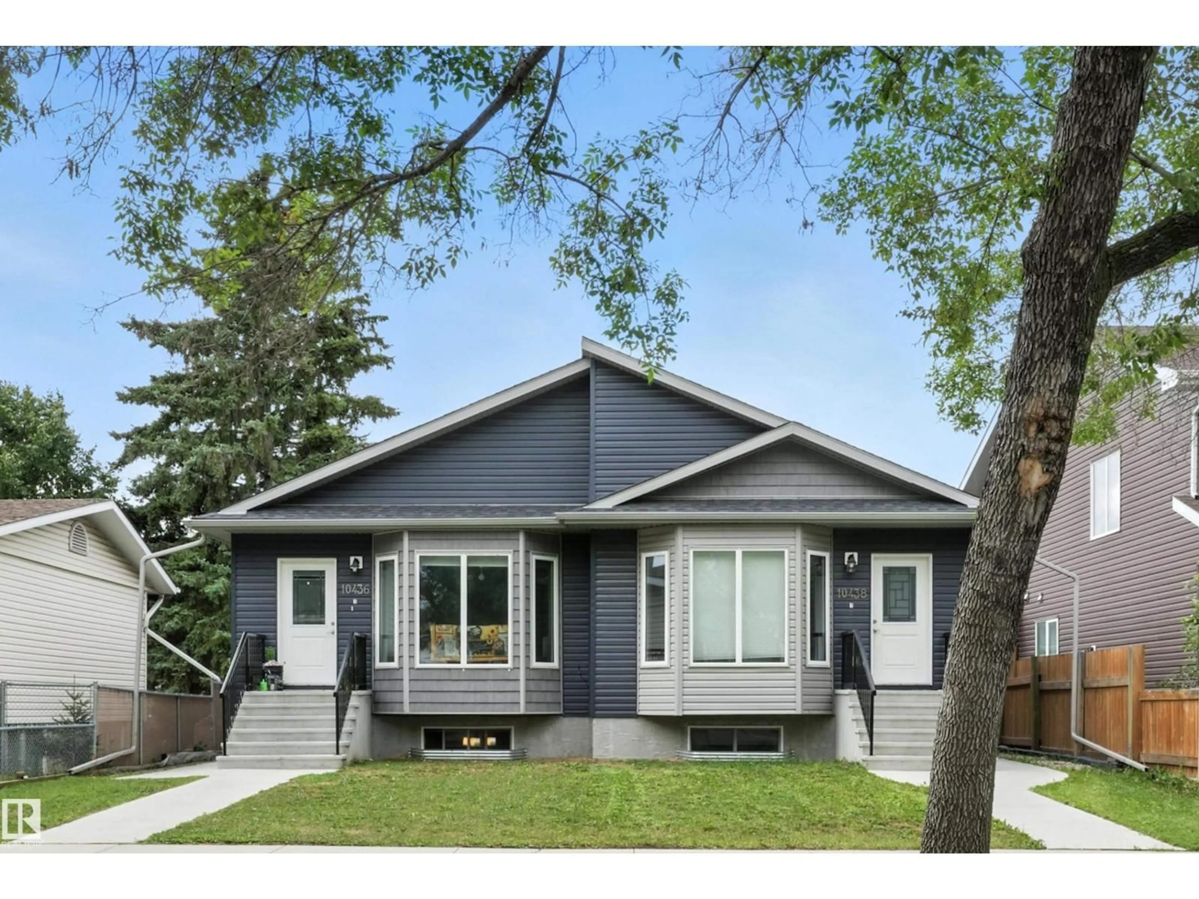 Home with vinyl exterior material, street for NW - 10438 154 ST, Edmonton Alberta T5P2H8