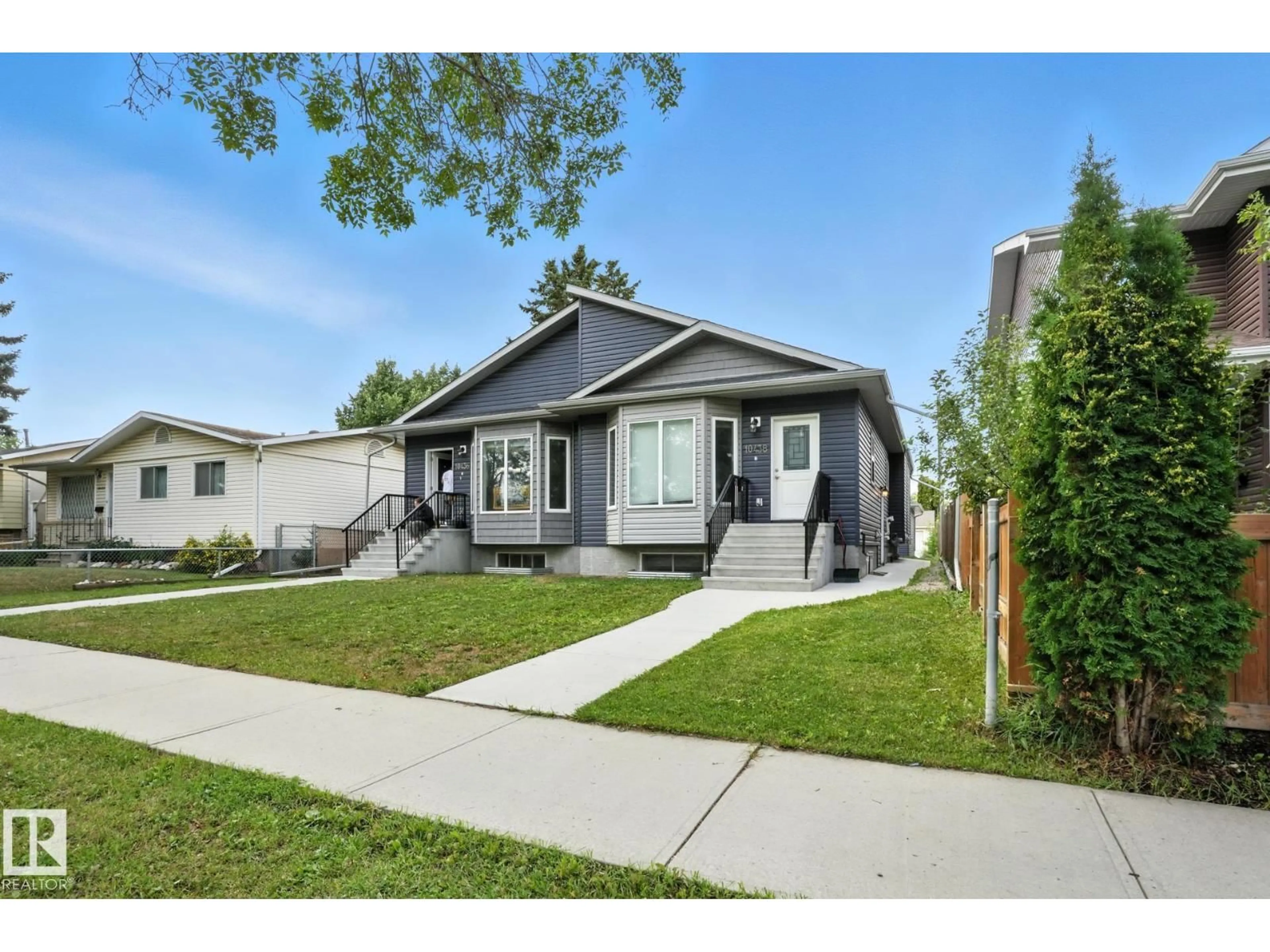 Home with vinyl exterior material, street for NW - 10438 154 ST, Edmonton Alberta T5P2H8