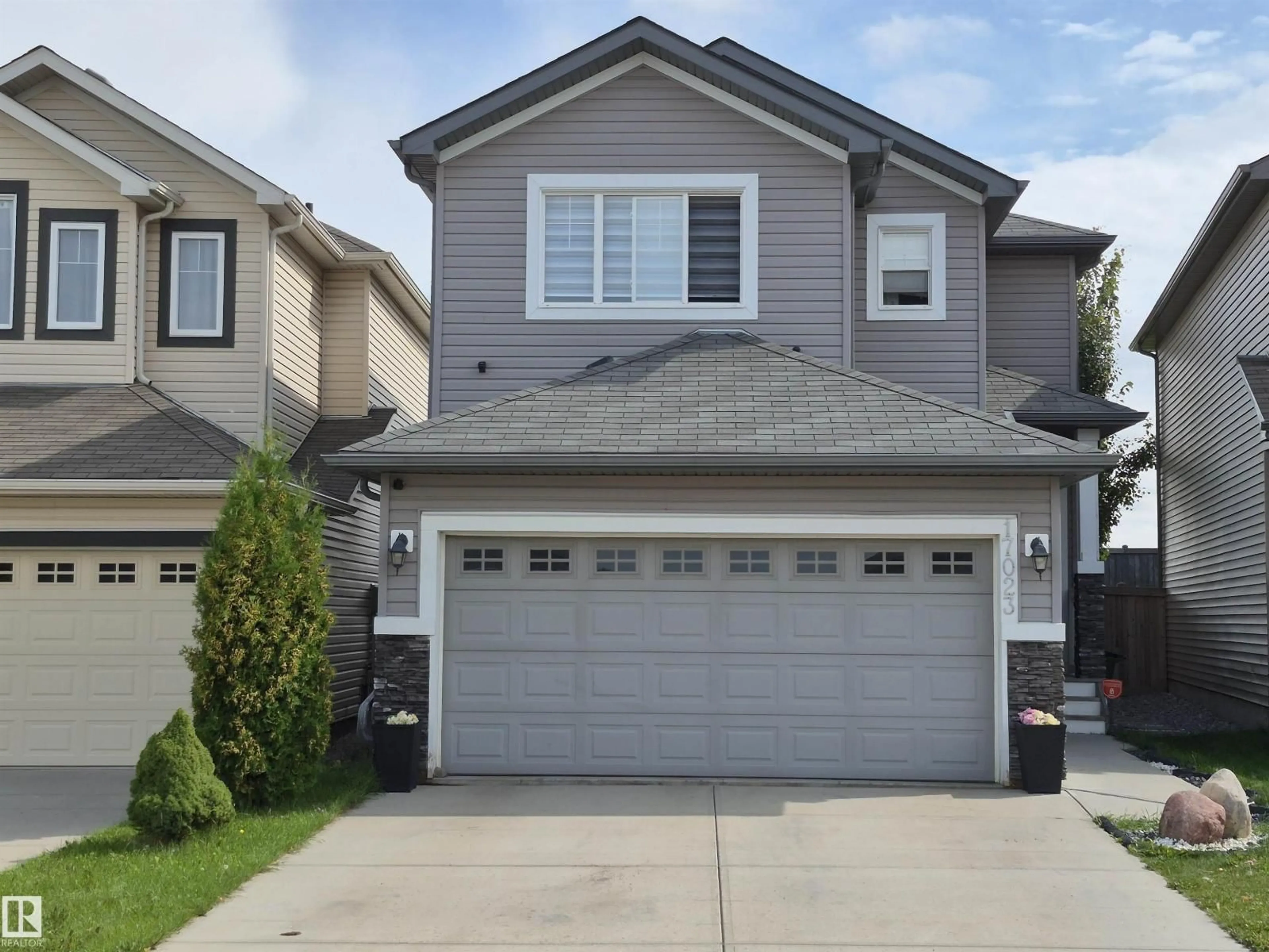 Home with vinyl exterior material, street for NW - 17023 38 ST, Edmonton Alberta T5Y3S1