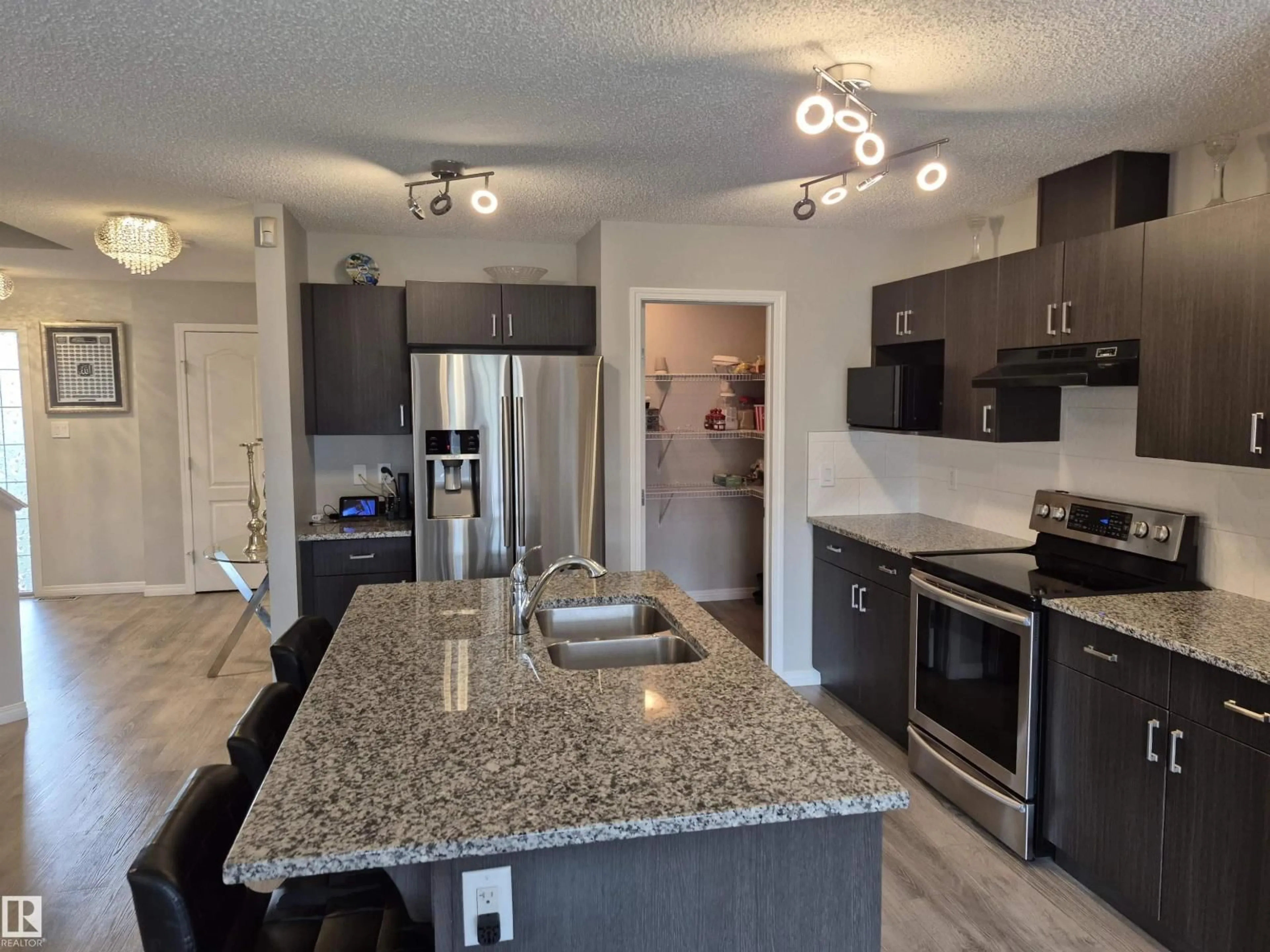Open concept kitchen, unknown for NW - 17023 38 ST, Edmonton Alberta T5Y3S1