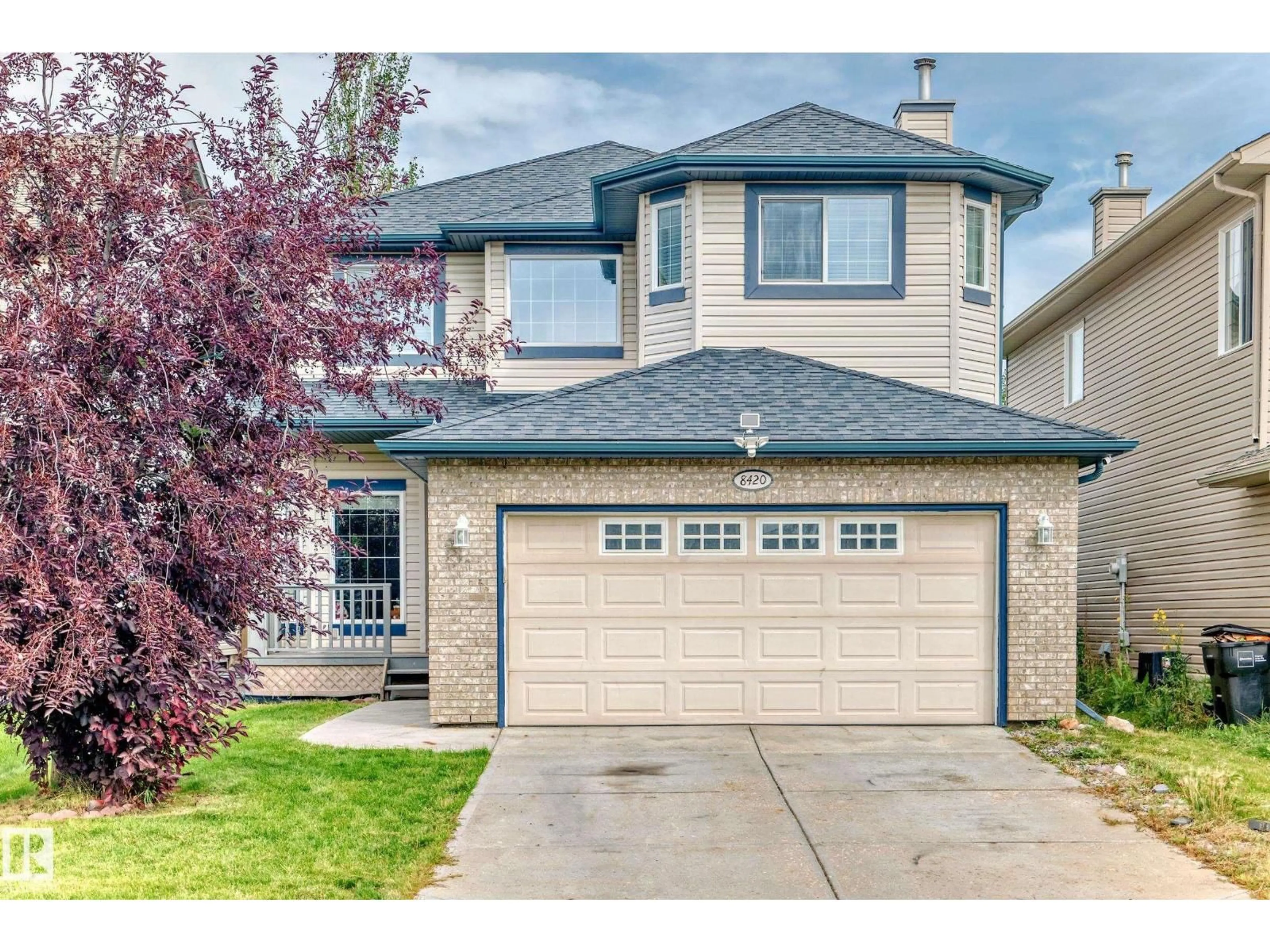 Home with vinyl exterior material, street for 8420 SLOANE CR, Edmonton Alberta T6R0L4
