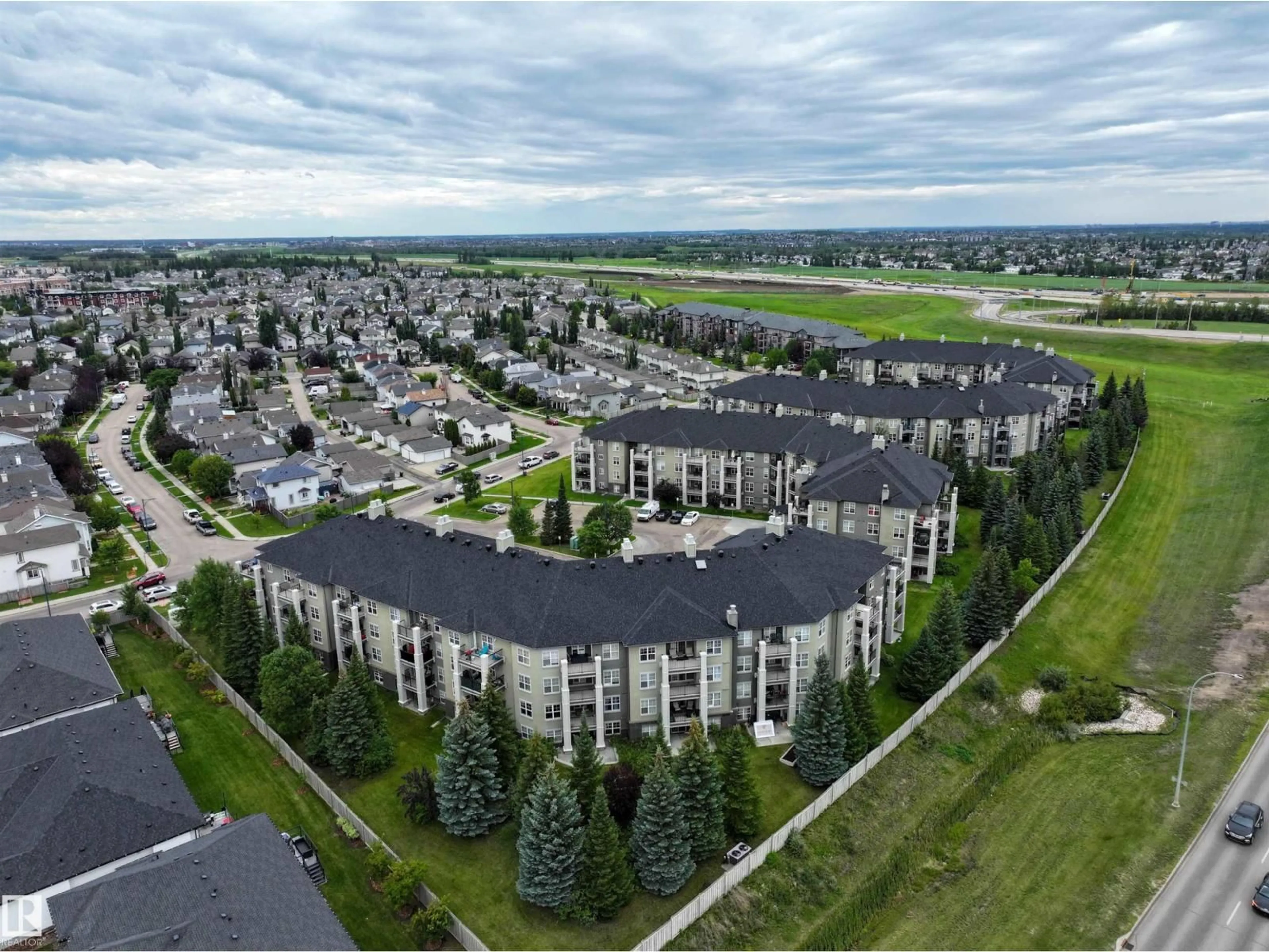 A pic from outside/outdoor area/front of a property/back of a property/a pic from drone, unknown for 622 - 311 MCALLISTER LO, Edmonton Alberta T6W1N2