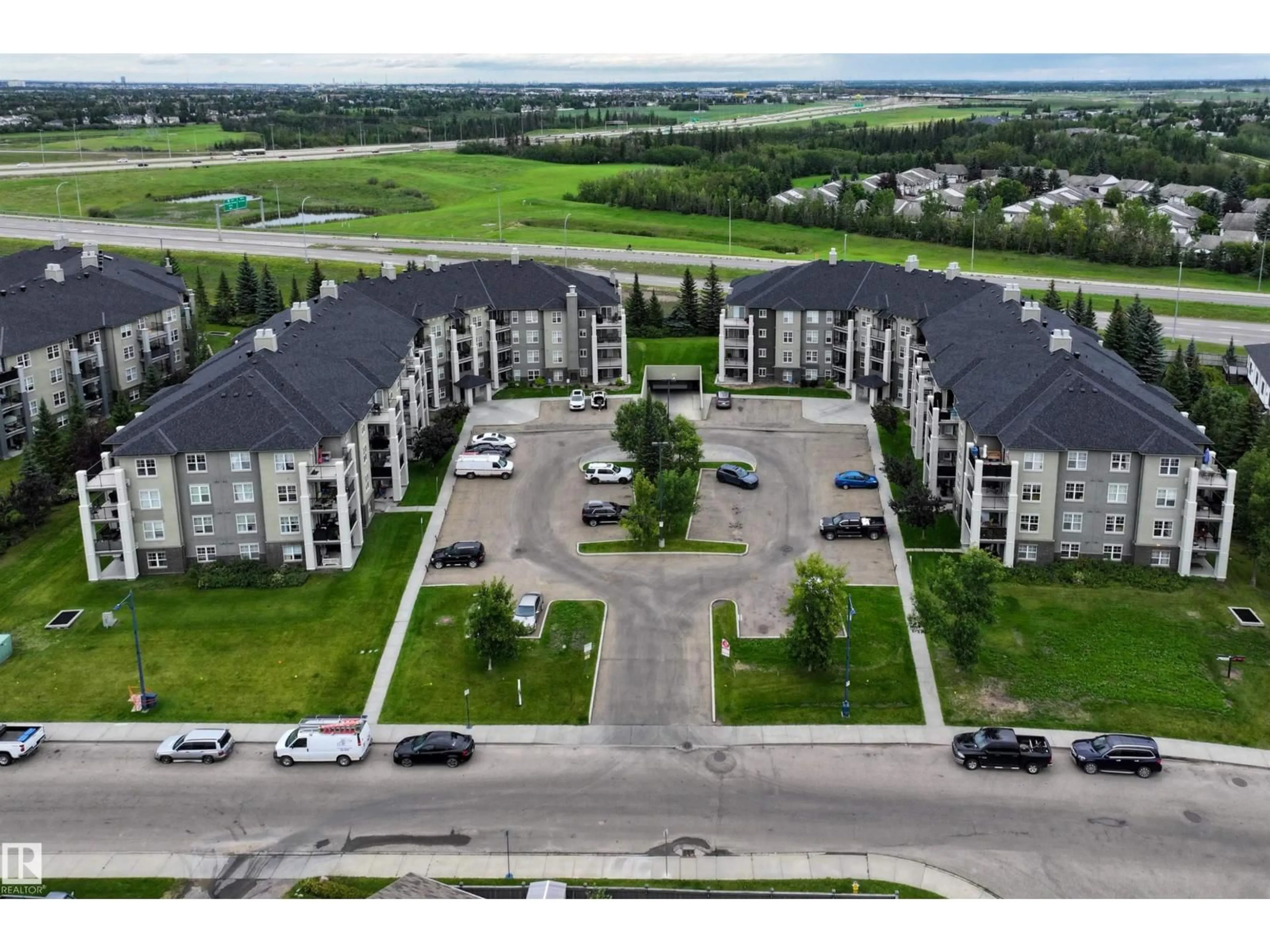 A pic from outside/outdoor area/front of a property/back of a property/a pic from drone, unknown for 622 - 311 MCALLISTER LO, Edmonton Alberta T6W1N2