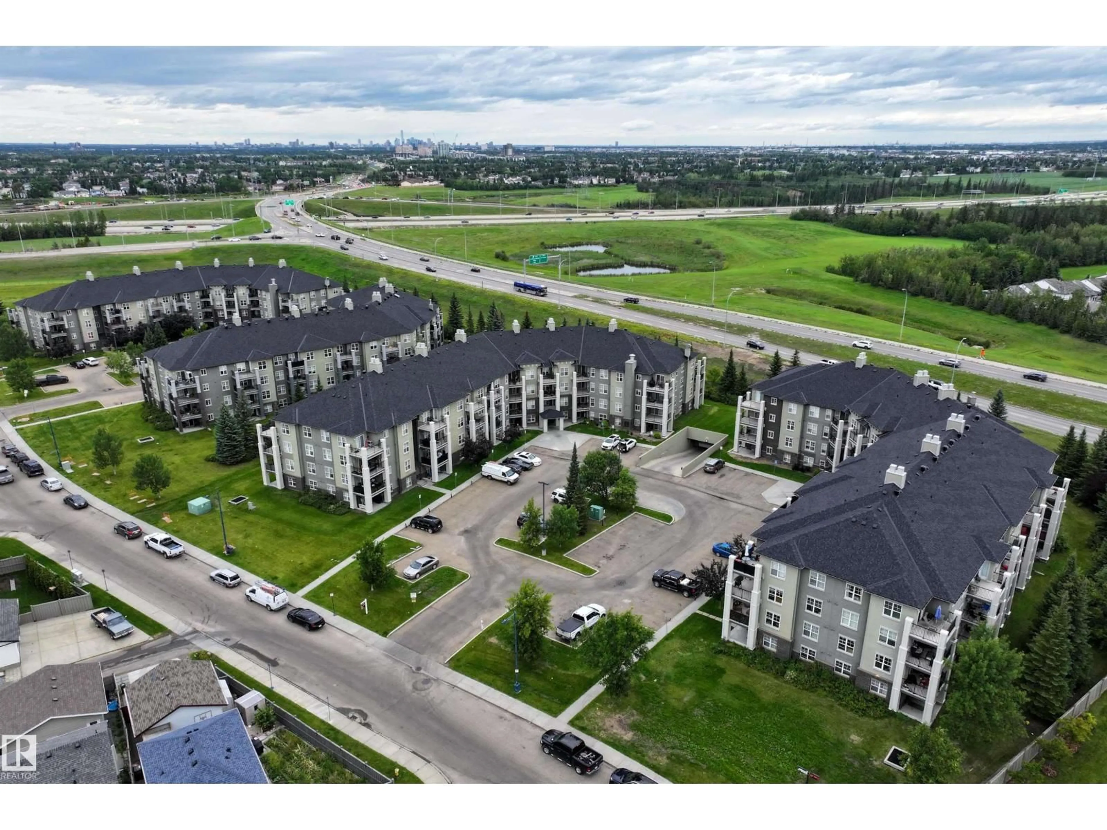 A pic from outside/outdoor area/front of a property/back of a property/a pic from drone, unknown for 622 - 311 MCALLISTER LO, Edmonton Alberta T6W1N2