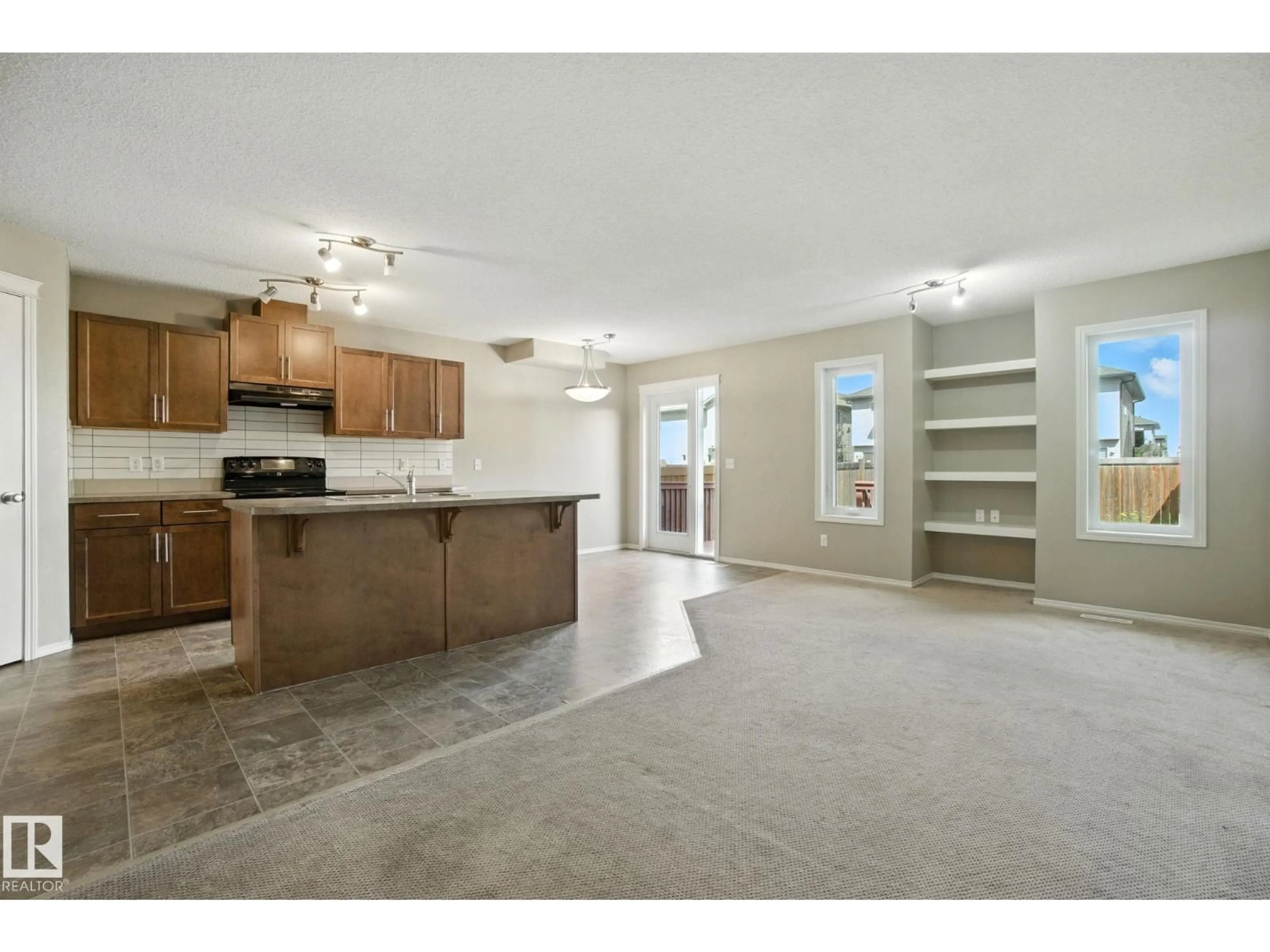 Open concept kitchen, unknown for 3108 16 AV, Edmonton Alberta T6T0T8