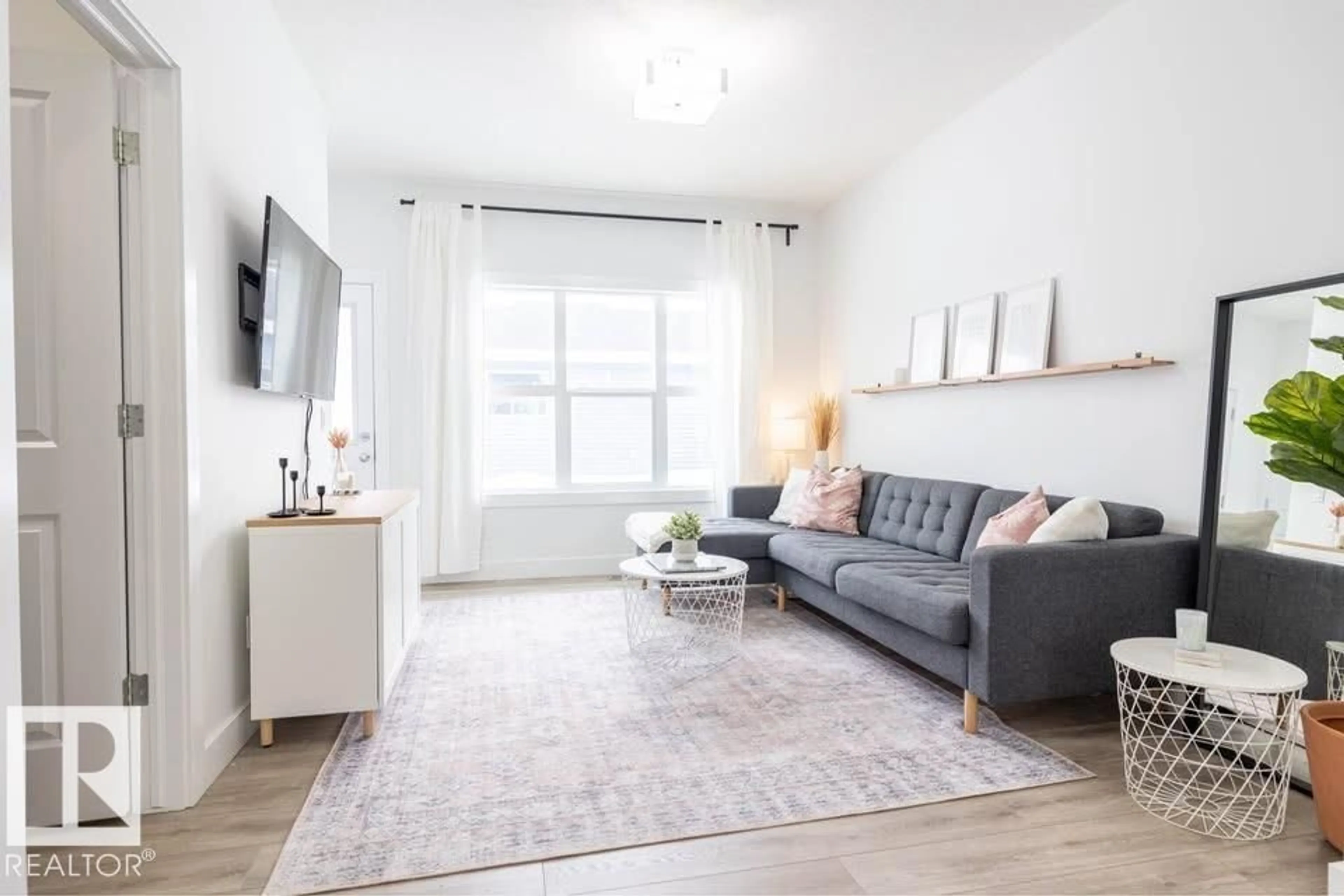 Living room with furniture, unknown for 16638 31 AV, Edmonton Alberta T6W4P8