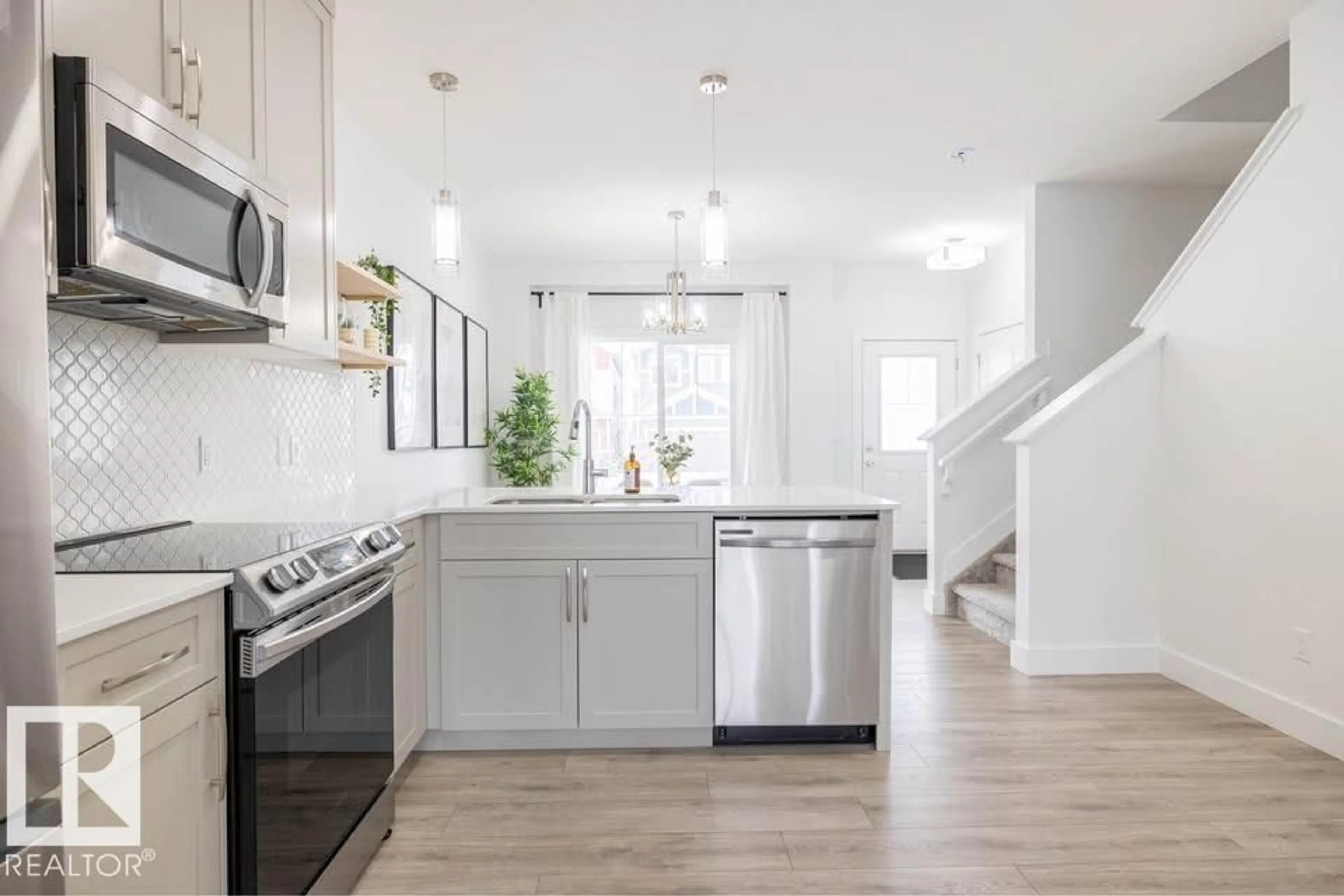 Open concept kitchen, unknown for 16638 31 AV, Edmonton Alberta T6W4P8