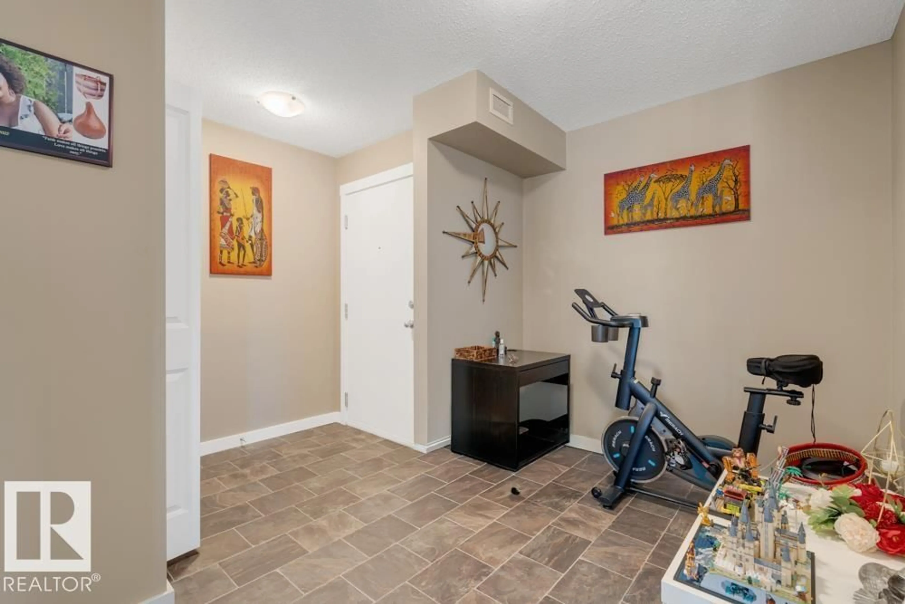 Indoor entryway for #102 - 5816 MULLEN PL, Edmonton Alberta T6R0W3