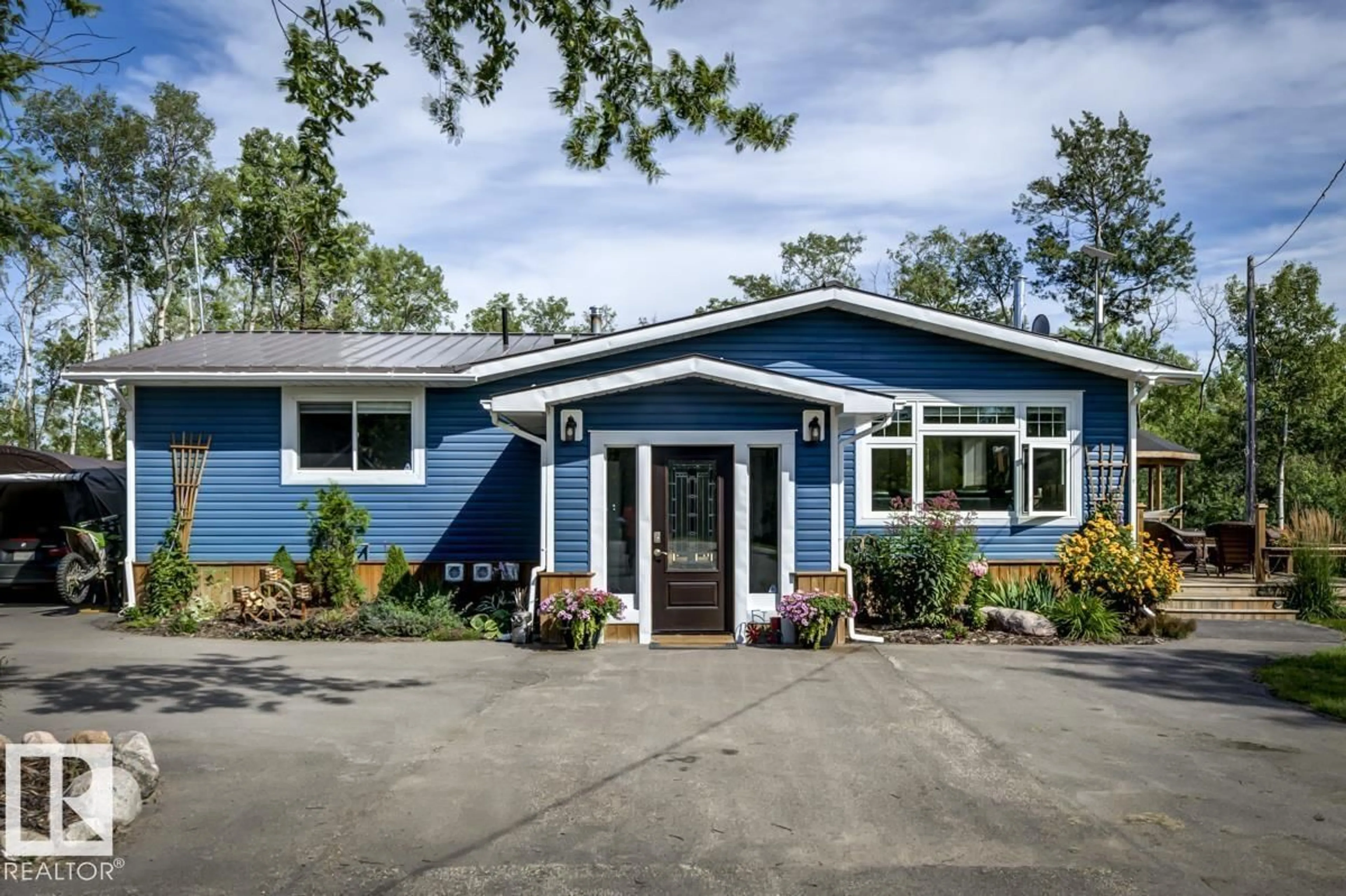 Home with vinyl exterior material, street for 21539 TWP ROAD 520, Rural Strathcona County Alberta T8E1E3