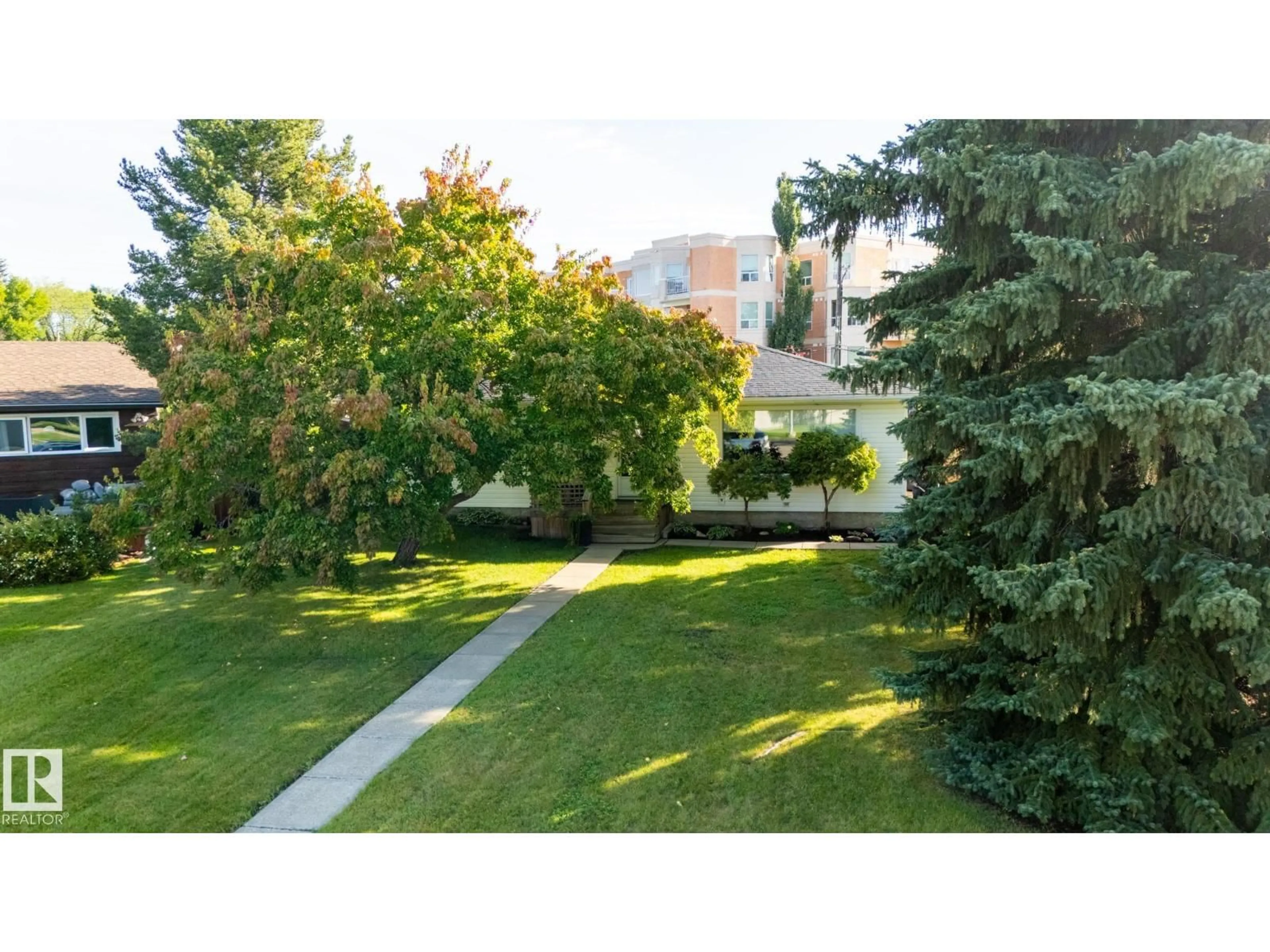 A pic from outside/outdoor area/front of a property/back of a property/a pic from drone, street for 9015 157 ST NW, Edmonton Alberta T5R2A6