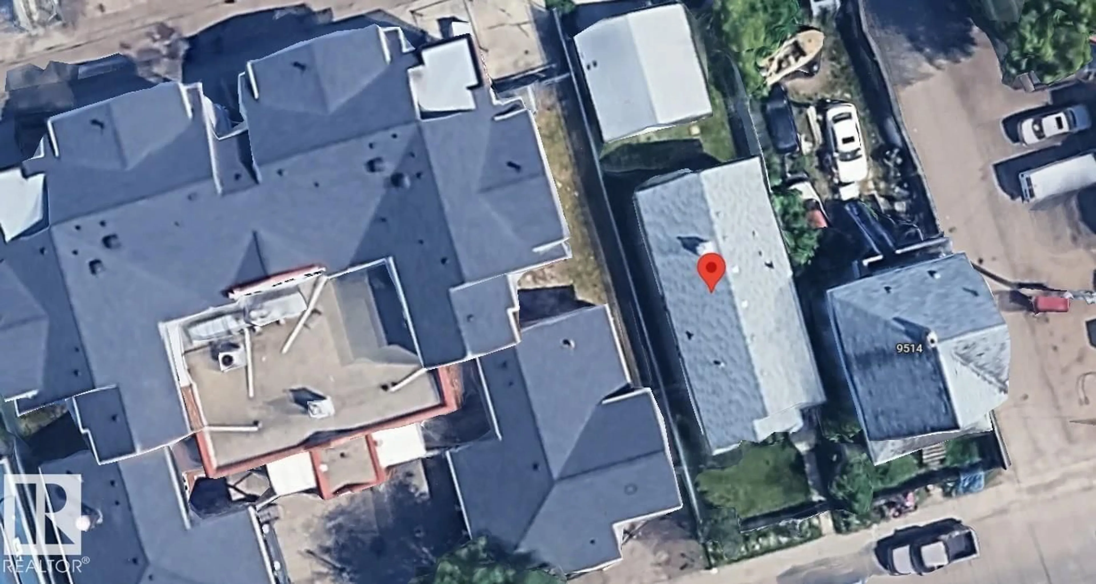 A pic from outside/outdoor area/front of a property/back of a property/a pic from drone, street for 9518 106 AV, Edmonton Alberta T5H0N2