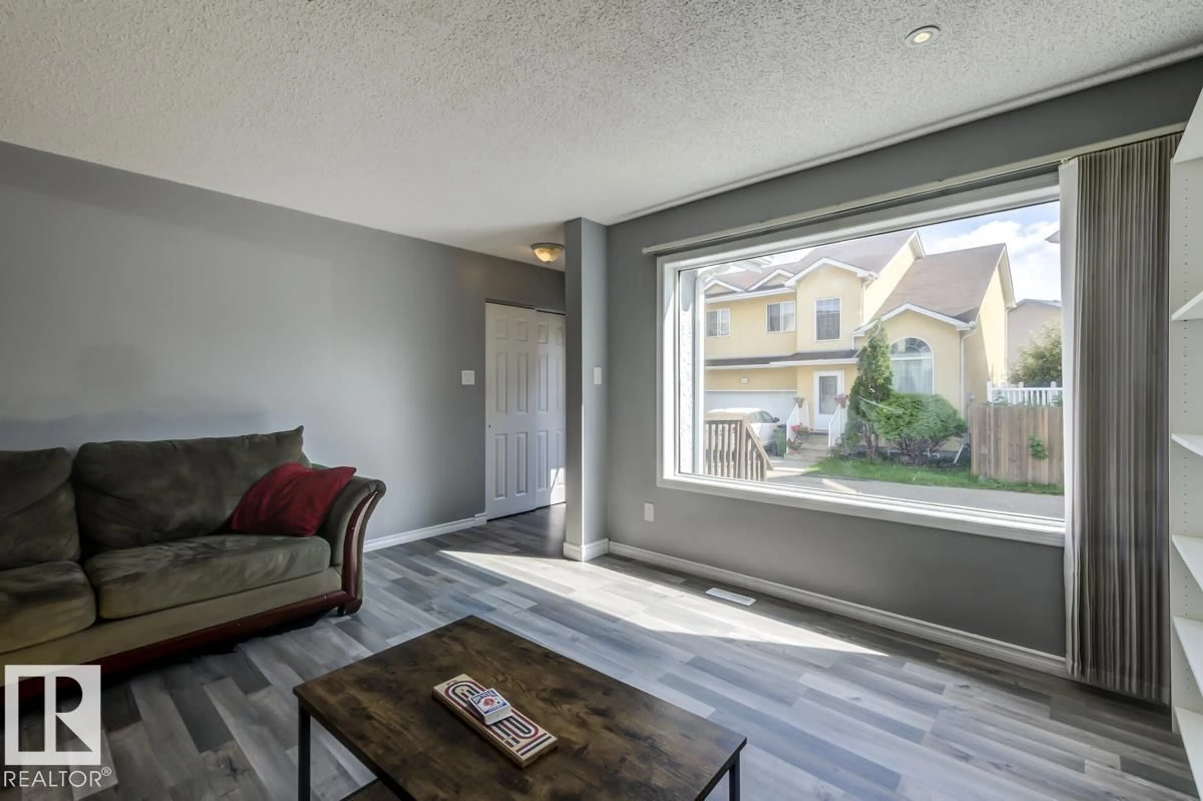 Living room with furniture, unknown for NW - 14659 52 ST, Edmonton Alberta T5A4Z7